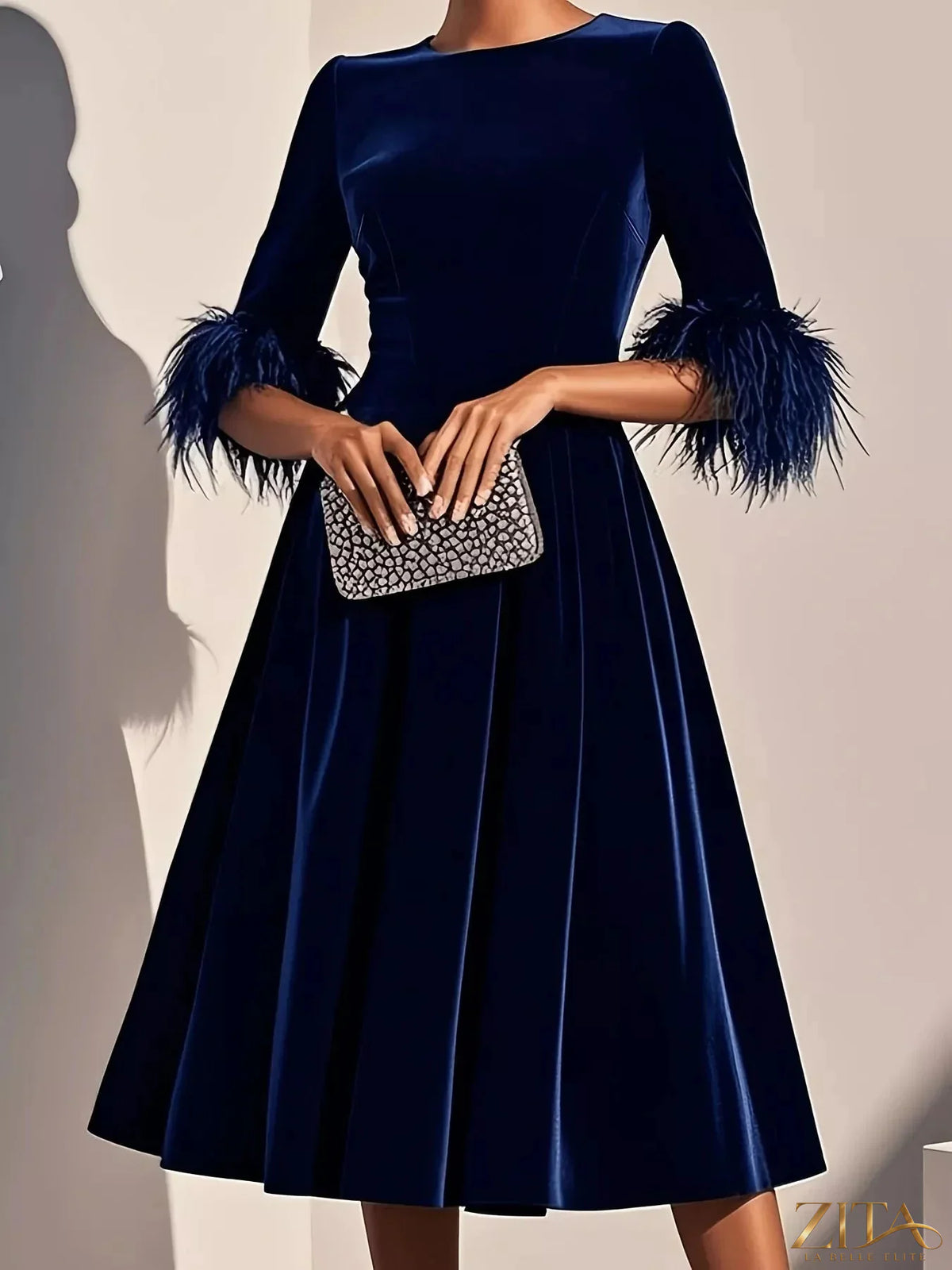 Zita La Belle Elite velvet midi dress with feather cuffs, elegant and stylish evening dress, shown in a close-up image.