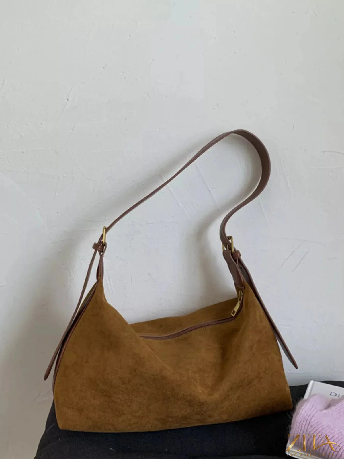 Zita La Belle Elite solid color suede hobo crossbody bag with rounded shape and shoulder strap, stylish accessory for casual outfits.
