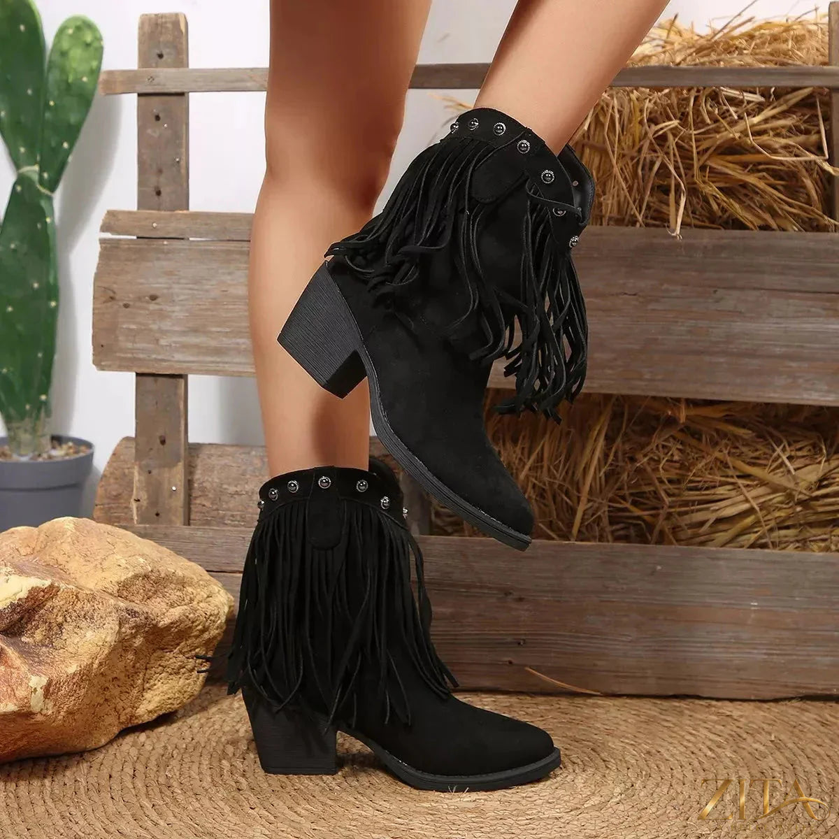 Trendsi fringed point toe boots featuring a stylish design with fringe detailing and a sleek pointed toe silhouette.