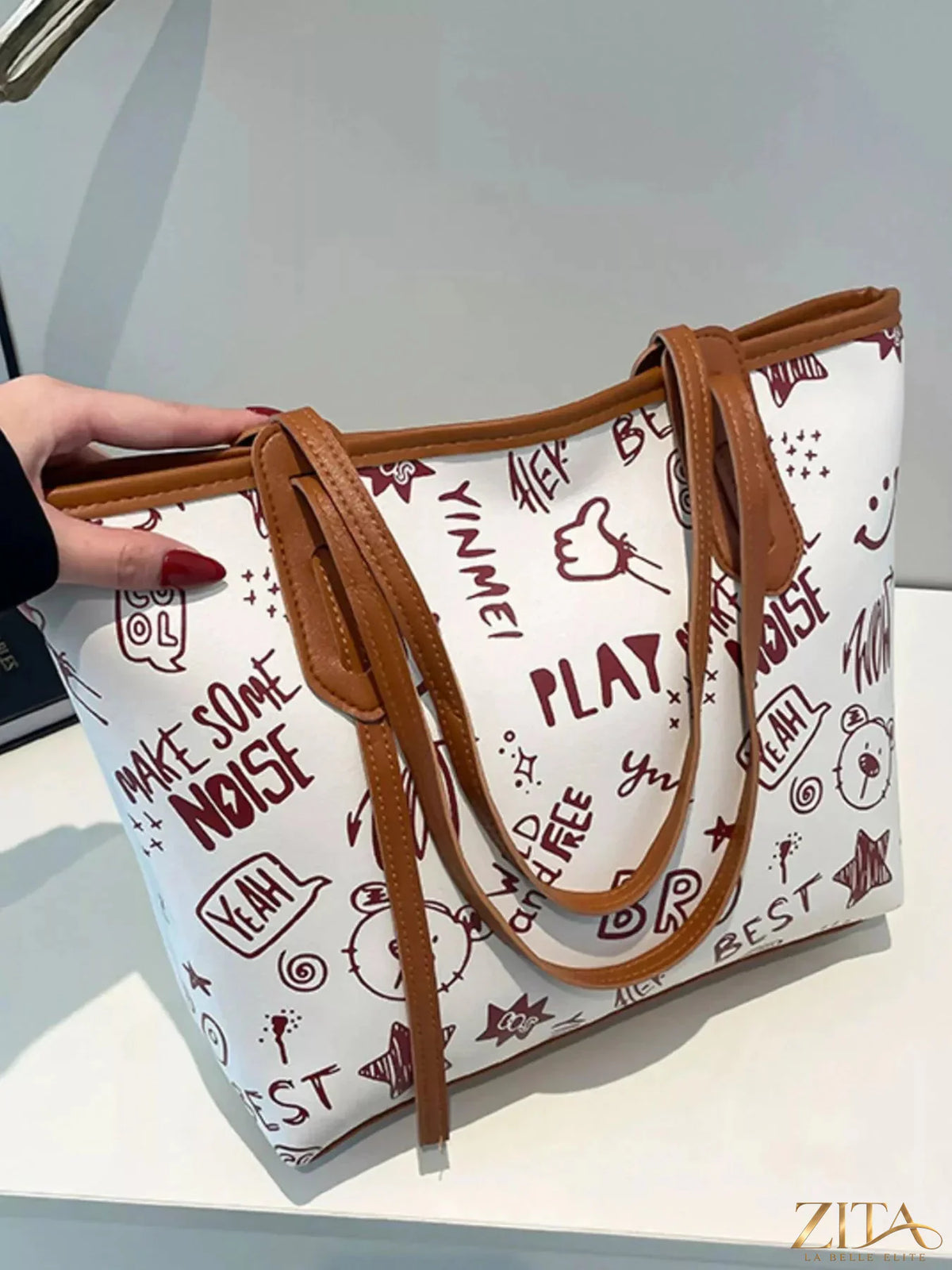 Zita La Belle Elite graffiti print casual tote bag with colorful urban graffiti design and sturdy handles.