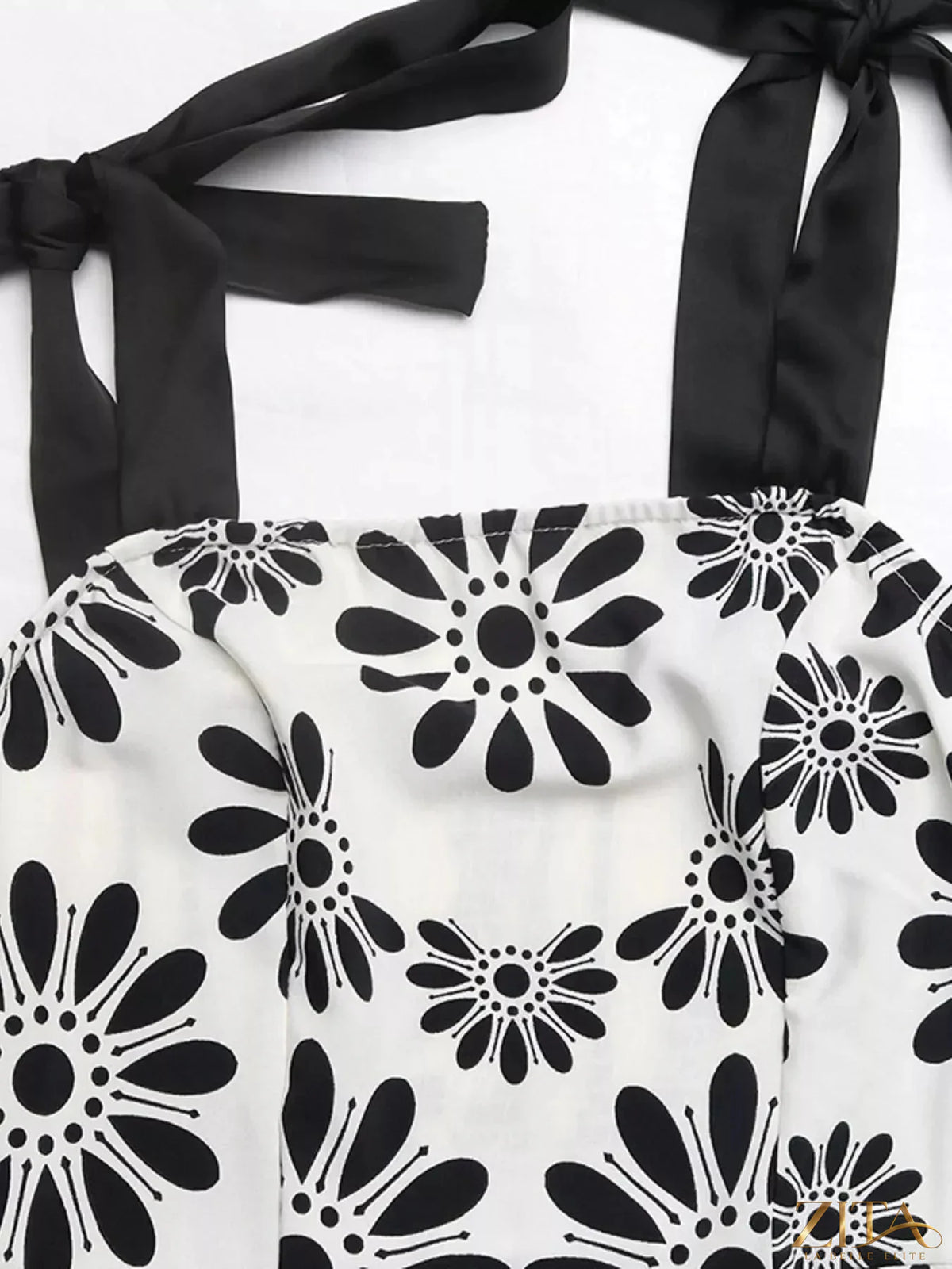 Zita La Belle Elite floral print tie strap casual maxi dress with a flowing silhouette and vibrant flower pattern.