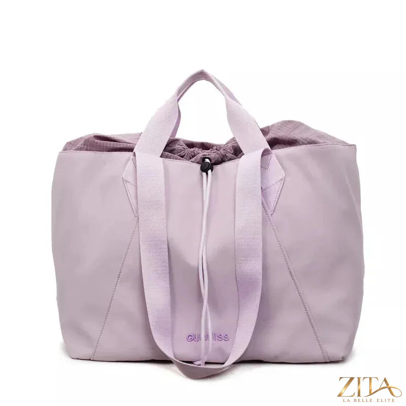 Lightweight Zita La Belle Elite travel tote bag with large capacity, shown in black with sturdy handles and spacious interior.