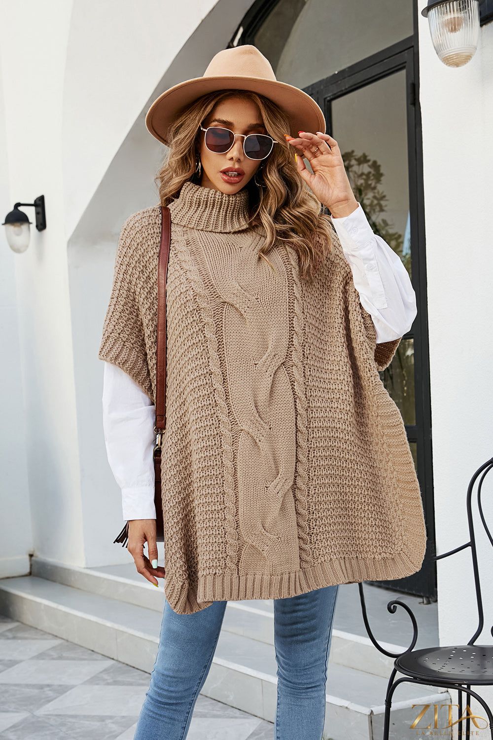 Zita La Belle Elite cable-knit turtleneck sweater with slit detail, soft textured knit in a stylish, cozy design.