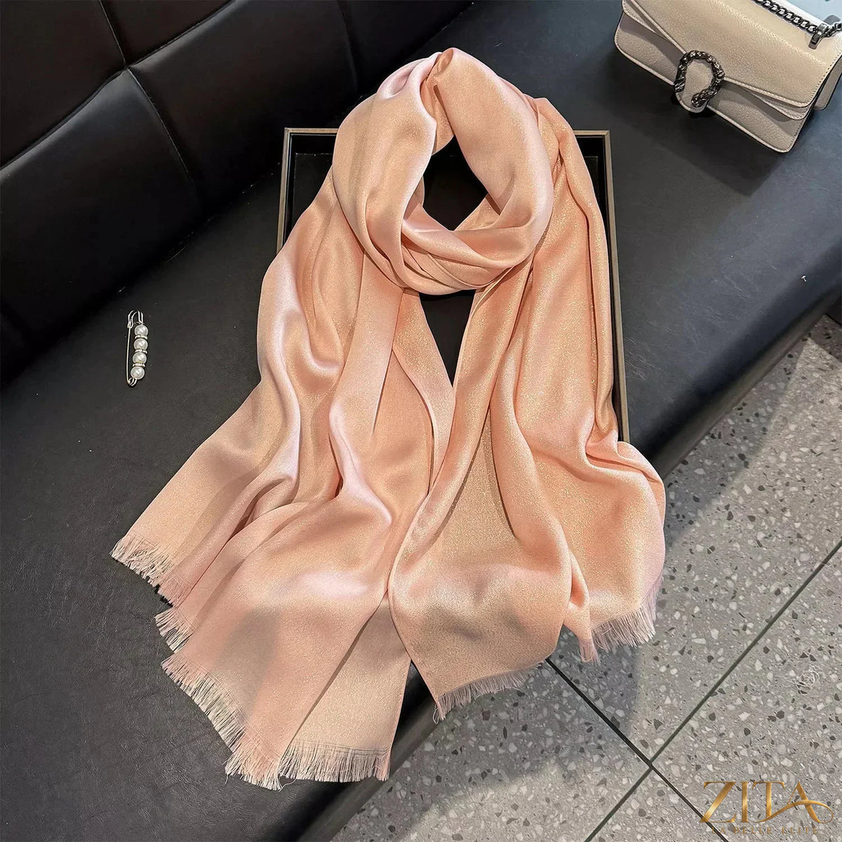 Raw hem scarf by Trendsi featuring lightweight, soft fabric with frayed edges for a casual, stylish accessory.