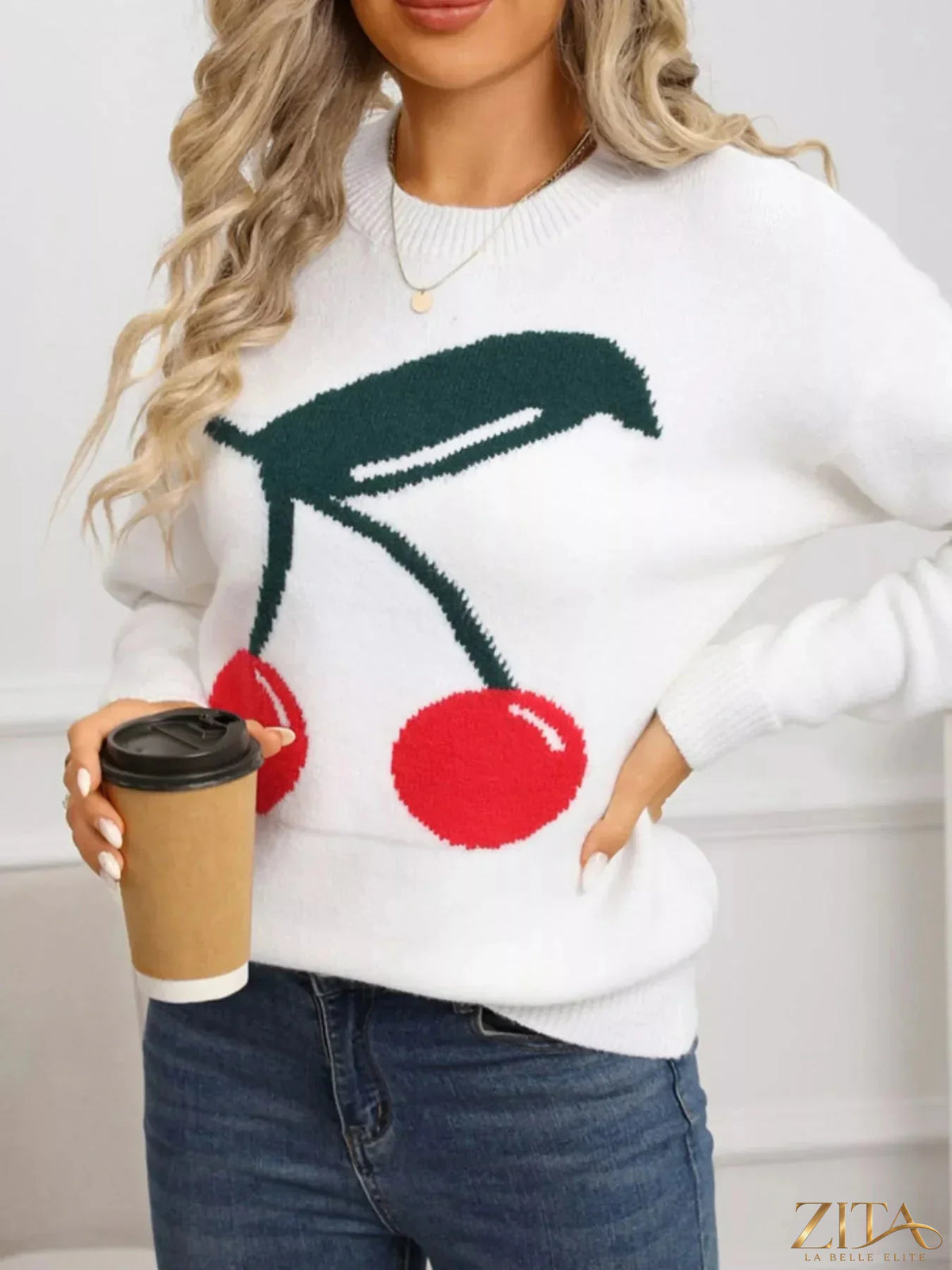 Cherry-colored round neck sweater from Trendsi with a cozy fit, featuring a smooth knit texture and classic design.