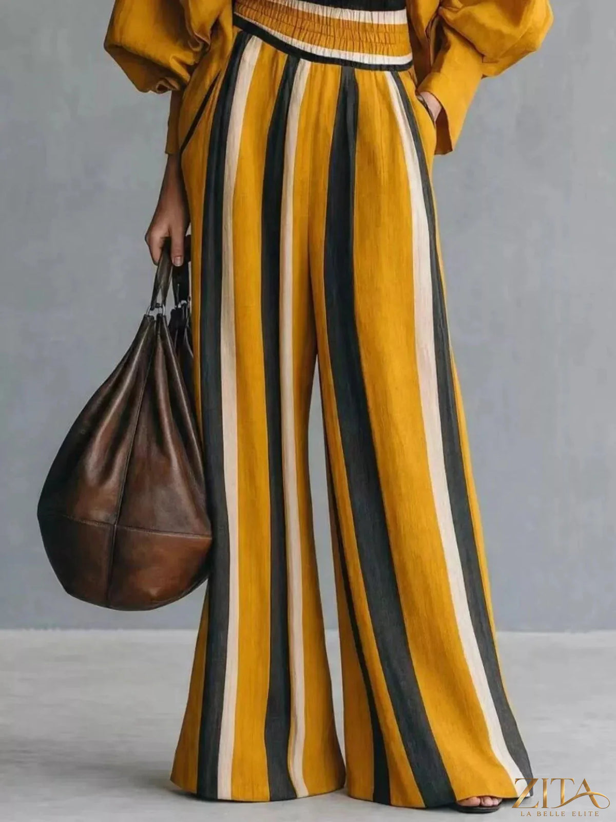 Plus size full size mock neck top and striped wide-leg pants set by Trendsi, featuring a stylish, coordinated outfit.