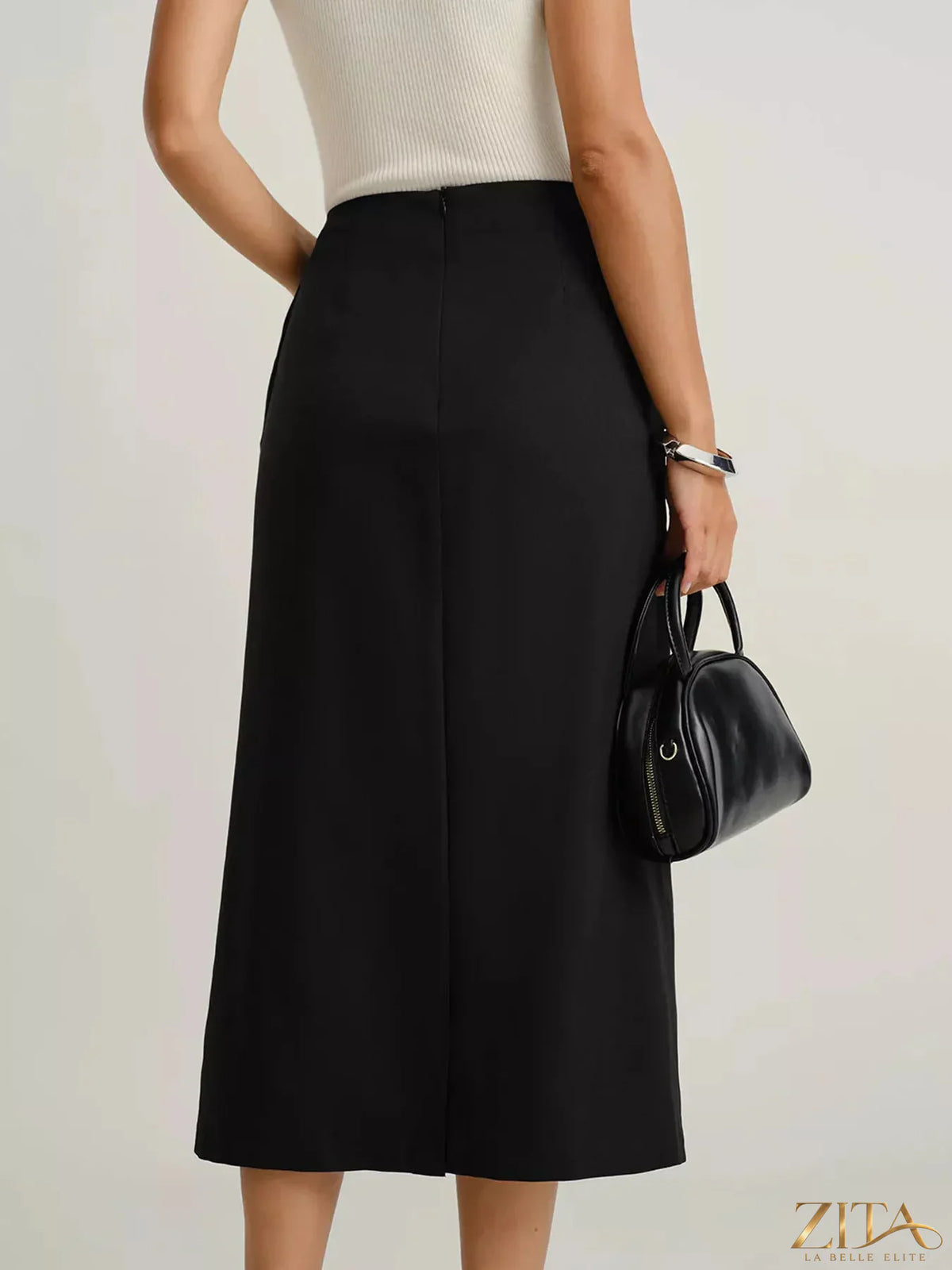Zita La Belle Elite button-front midi skirt with pockets, featuring a stylish design and flowing fabric.