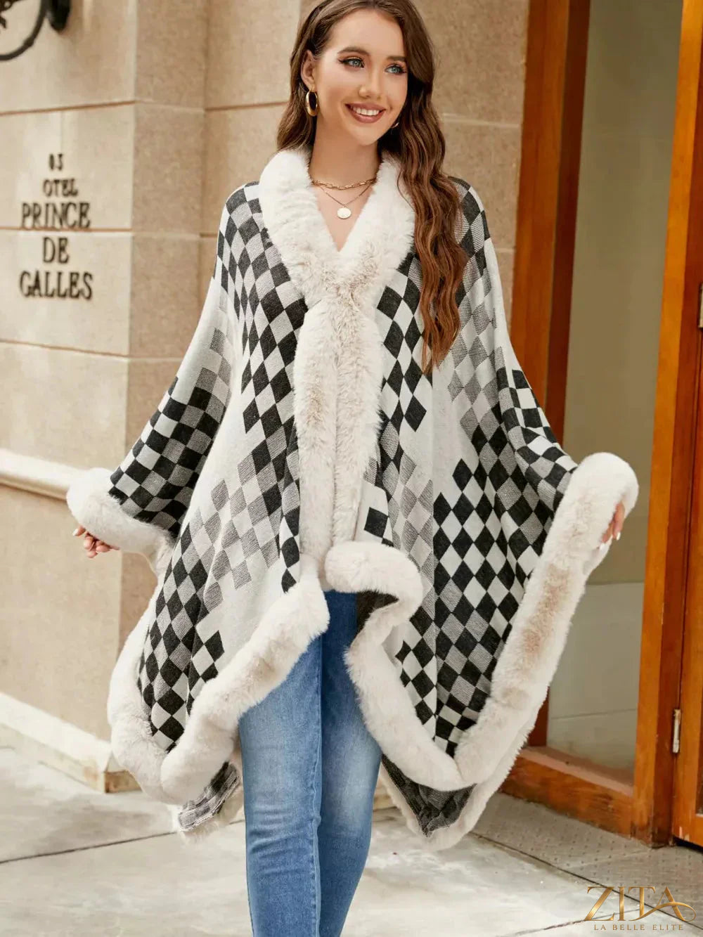 Checkered faux fur trim poncho by Zita La Belle Elite featuring a stylish checkered pattern and cozy faux fur details.