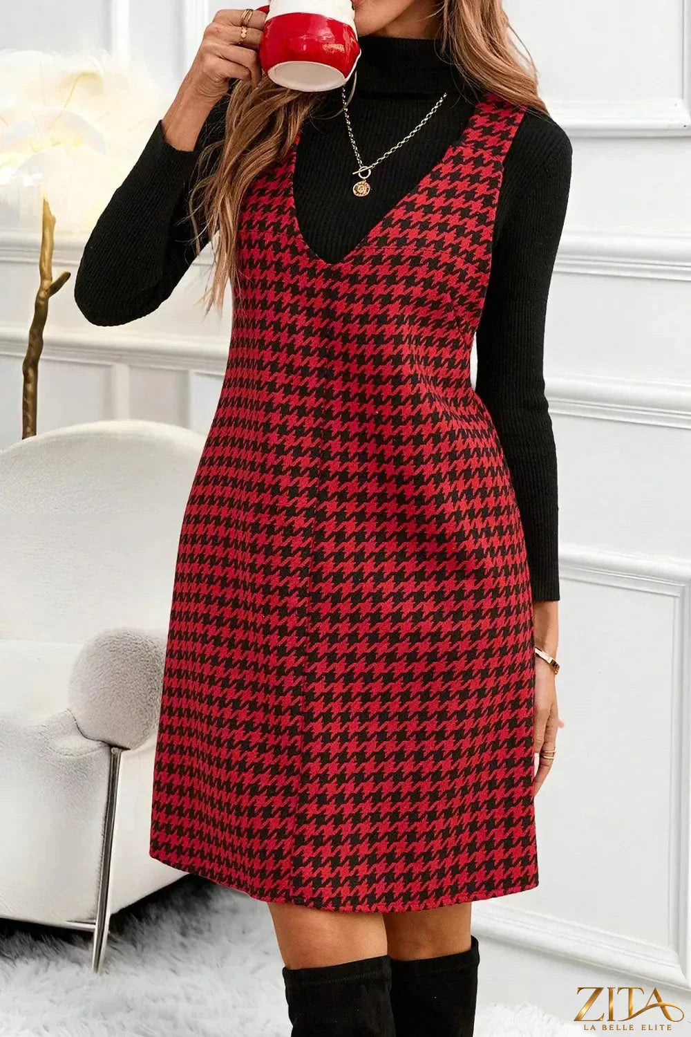 Houndstooth V-neck sleeveless mini dress by Trendsi featuring a fitted silhouette and classic pattern.