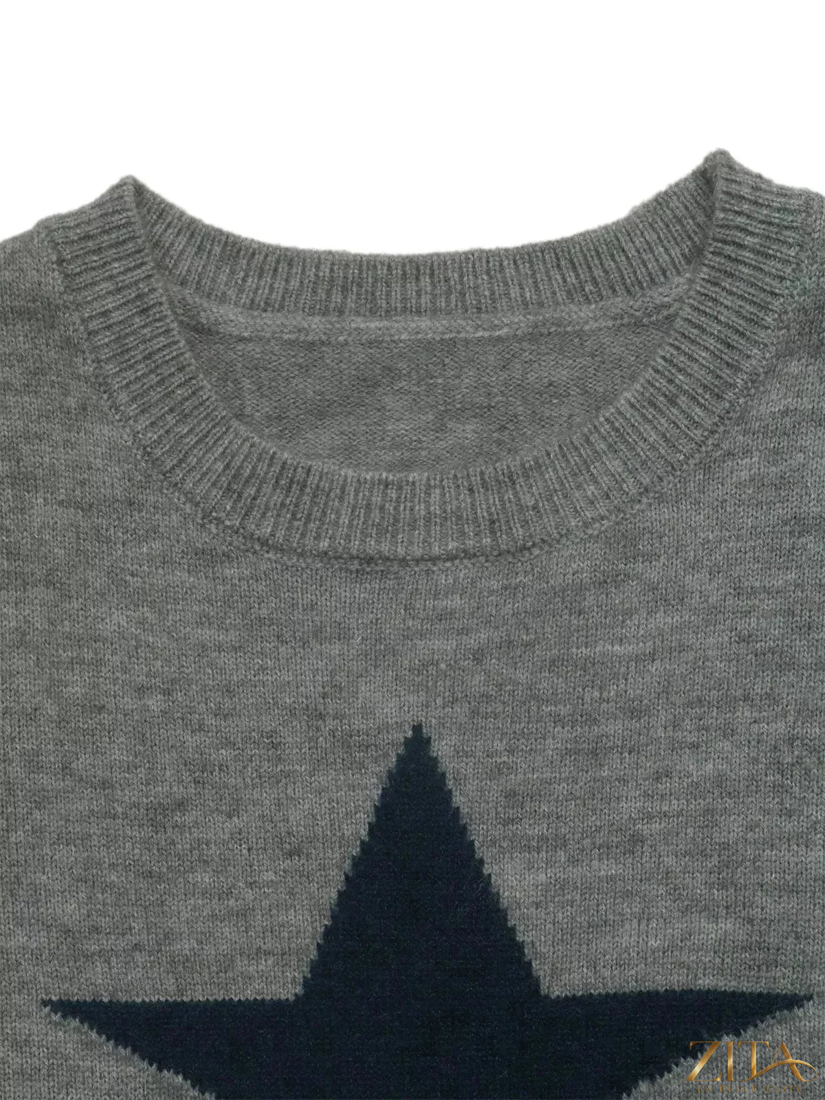 Star-patterned dropped shoulder sweater by Zita La Belle Elite, featuring a cozy knit with star designs on the front.