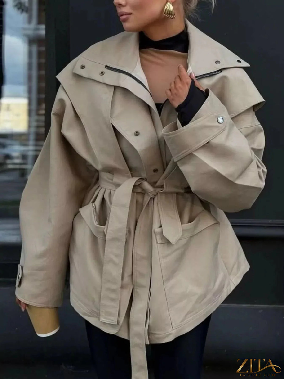 Zita La Belle Elite tie waist snap down trench coat with collar, long sleeves, and front pockets, shown on a model.