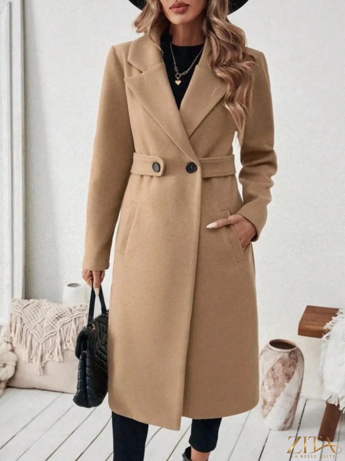 Plus size Zita La Belle Elite full-length coat with a lapel collar, belted waist, and front pockets for elegant winter wear.