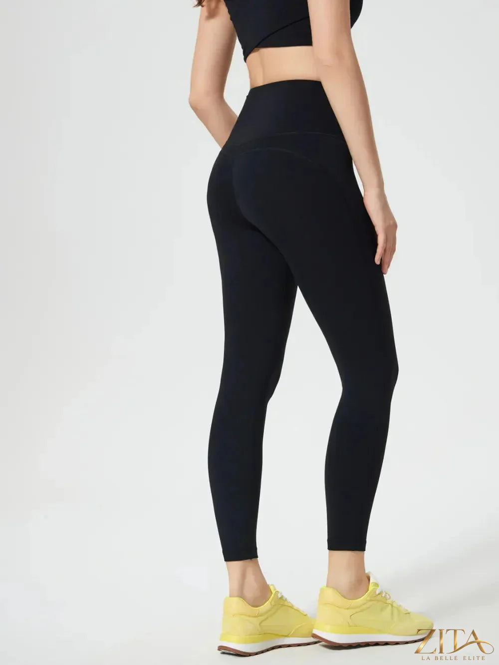 Trendsi Millennia wide waistband active leggings in black, featuring a high-rise fit and stretchy athletic fabric for comfortable movement.