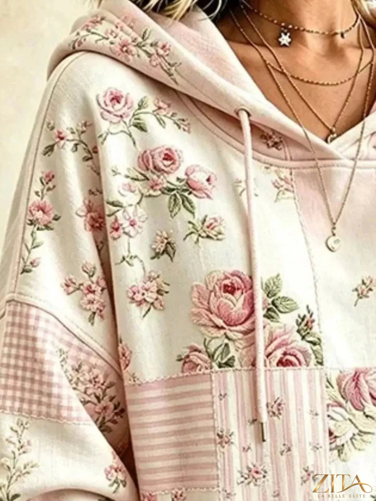 Plus size floral hoodie with dropped shoulders and drawstring detail by Zita La Belle Elite, showcasing the full front view.
