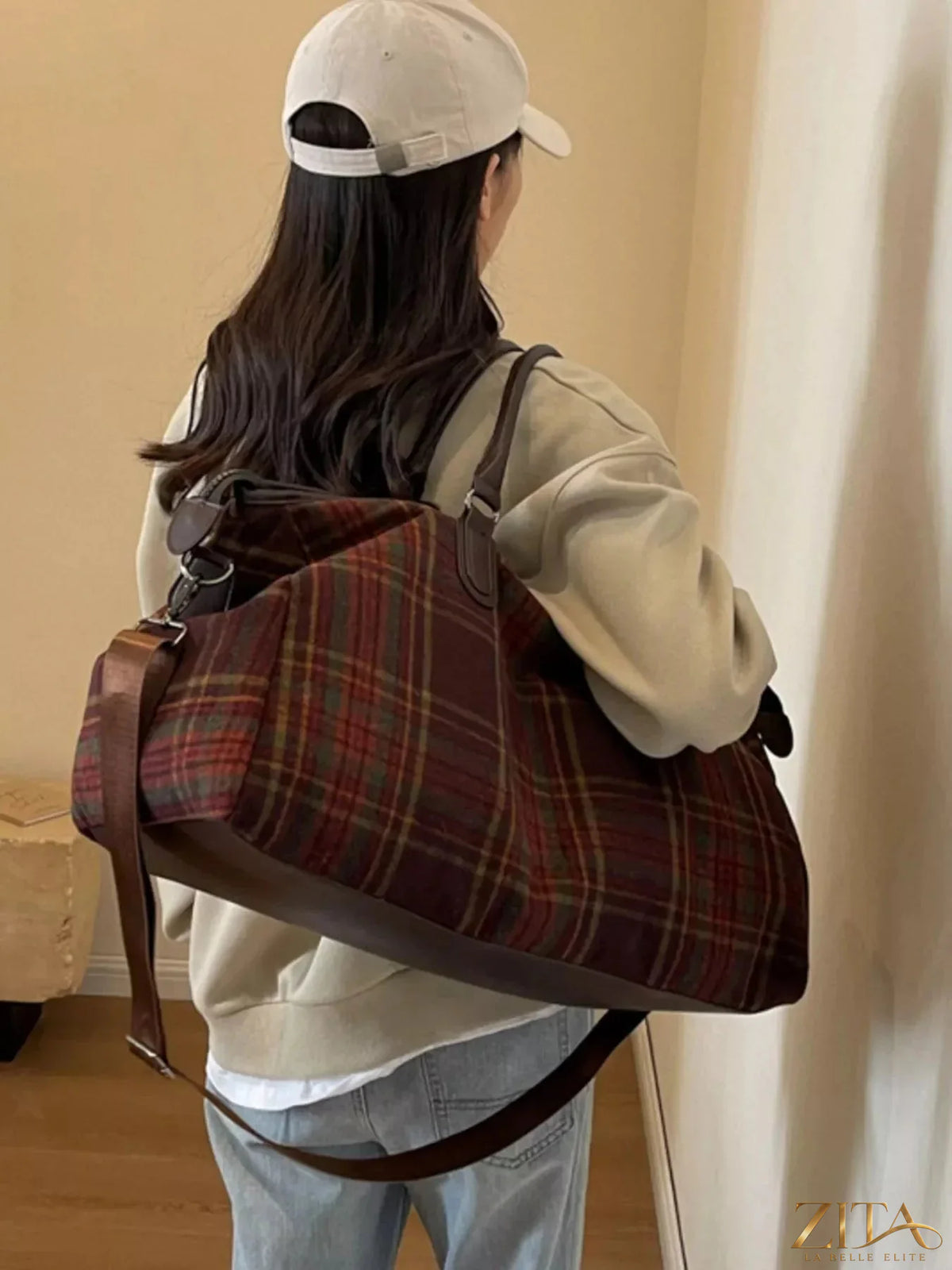 Vintage plaid pattern travel bag by Zita La Belle Elite, featuring sturdy handles and spacious interior for travel essentials.