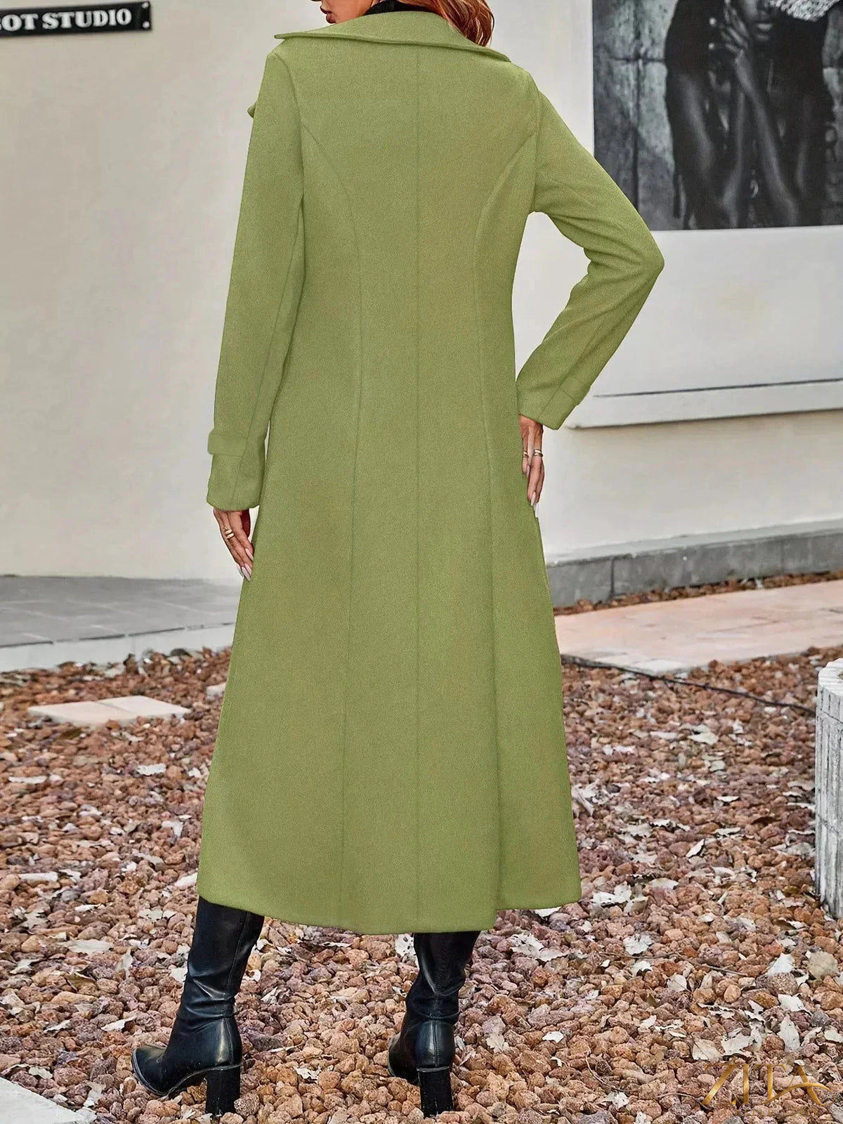 Zita La Belle Elite double-breasted longline coat displayed on a model, featuring tailored fit and classic lapel design.