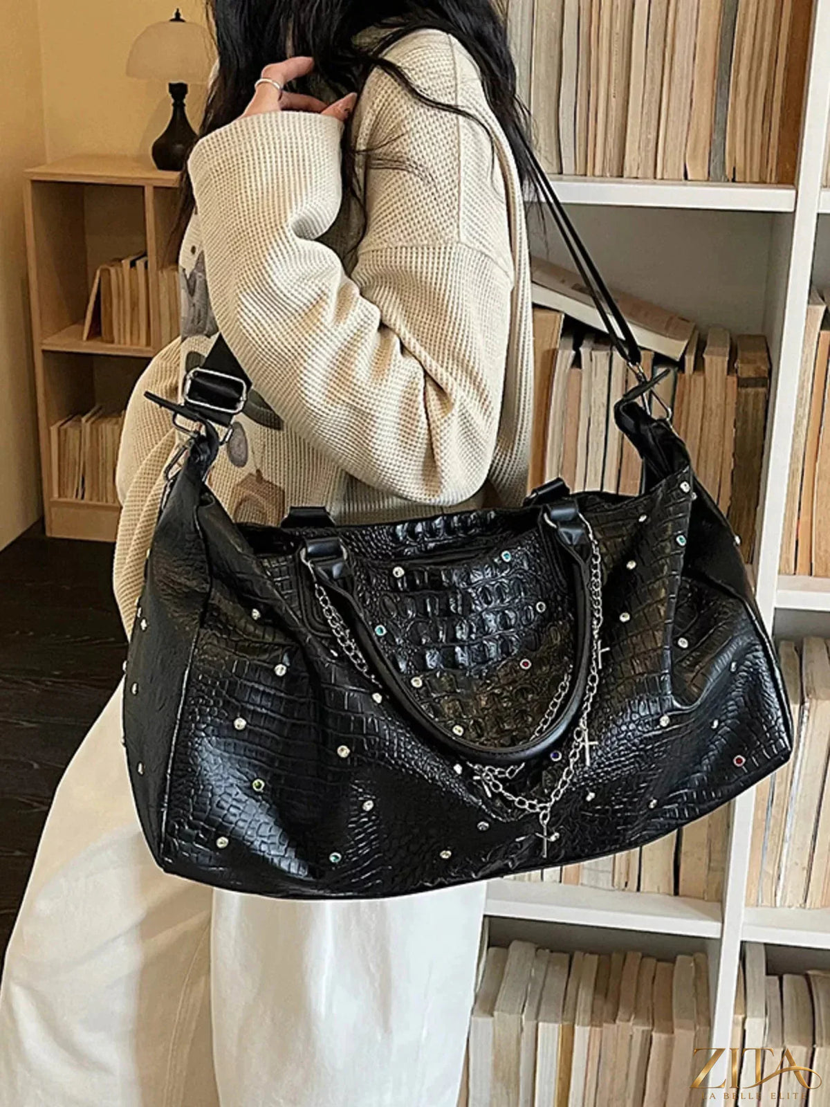 Studded large capacity travel bag by Zita La Belle Elite with multiple compartments and sturdy handles for easy travel.