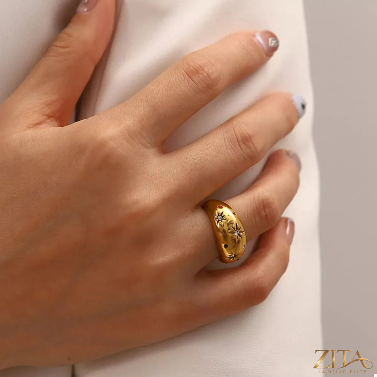 18K gold-plated zircon ring with sparkling stones, elegant jewelry piece from Zita La Belle Elite displayed on a white background