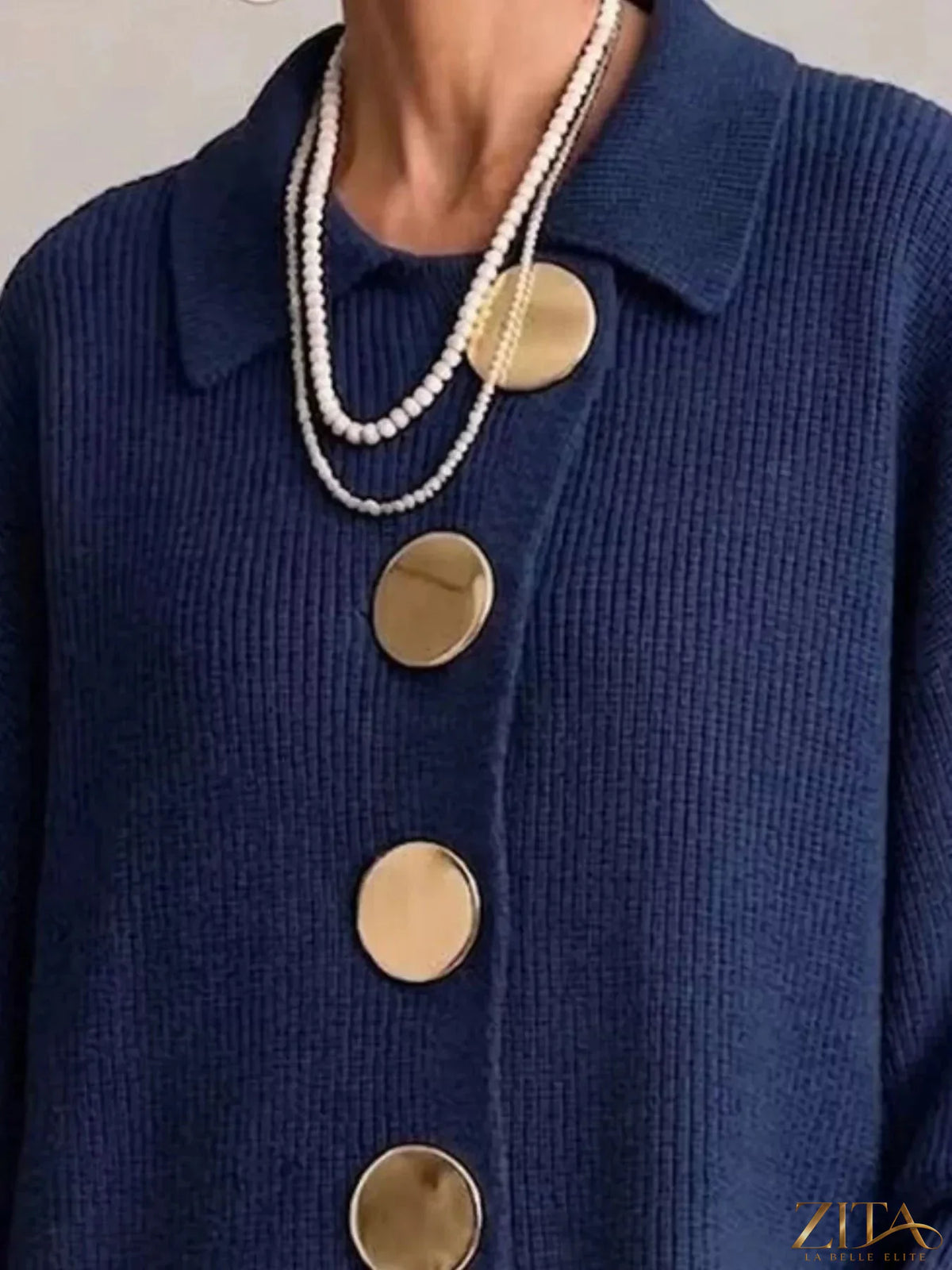 Plus size ribbed knit cardigan with gold buttons by Zita La Belle Elite, showcasing a full-length gold-buttoned design.