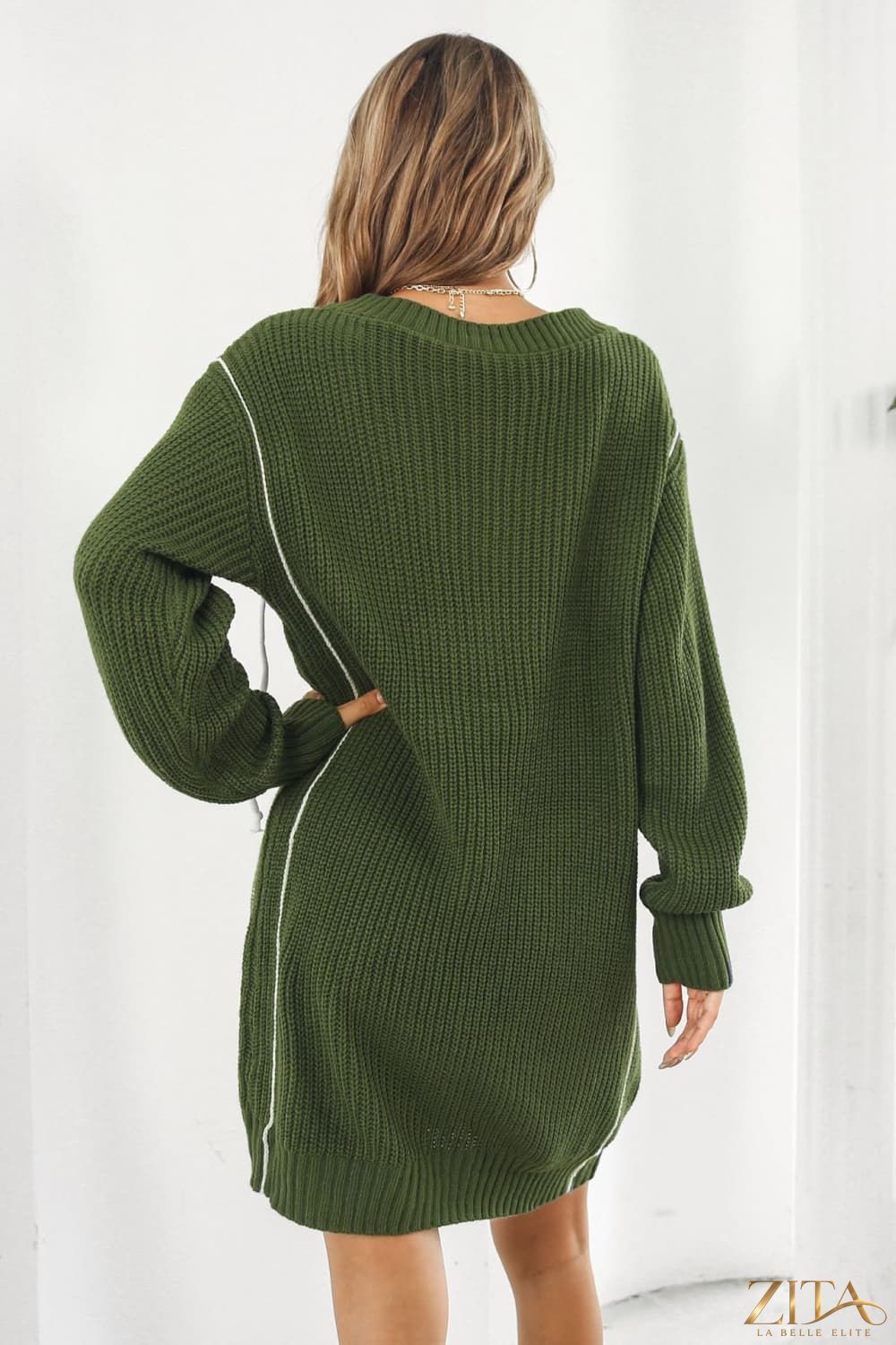 Contrast V-Neck Sweater Dress by Trendsi featuring a fitted silhouette, long sleeves, and a stylish V-neck design.