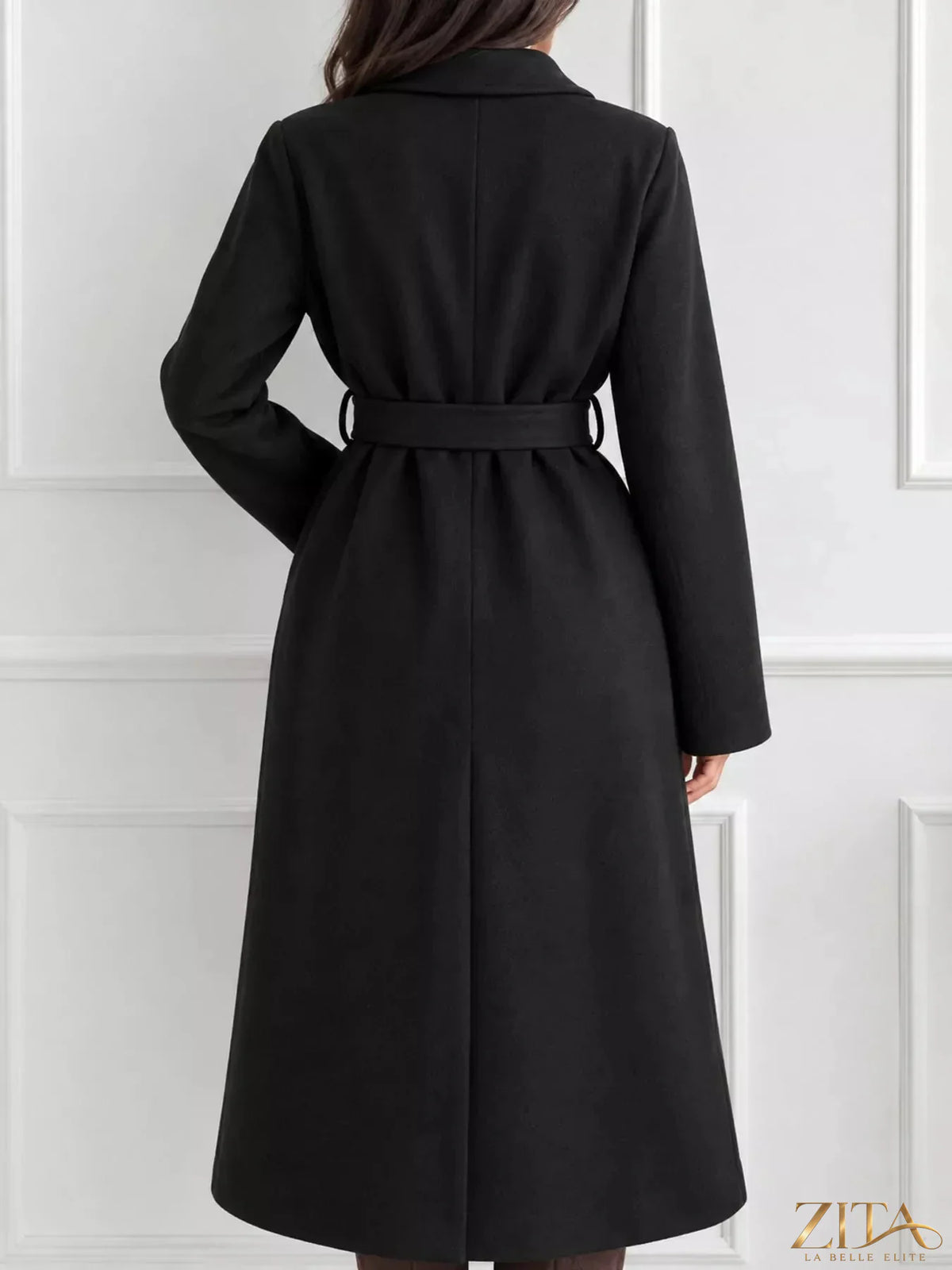 Zita La Belle Elite belted coat with lapel collar, long sleeves, and tailored design, shown in a stylish outerwear image.