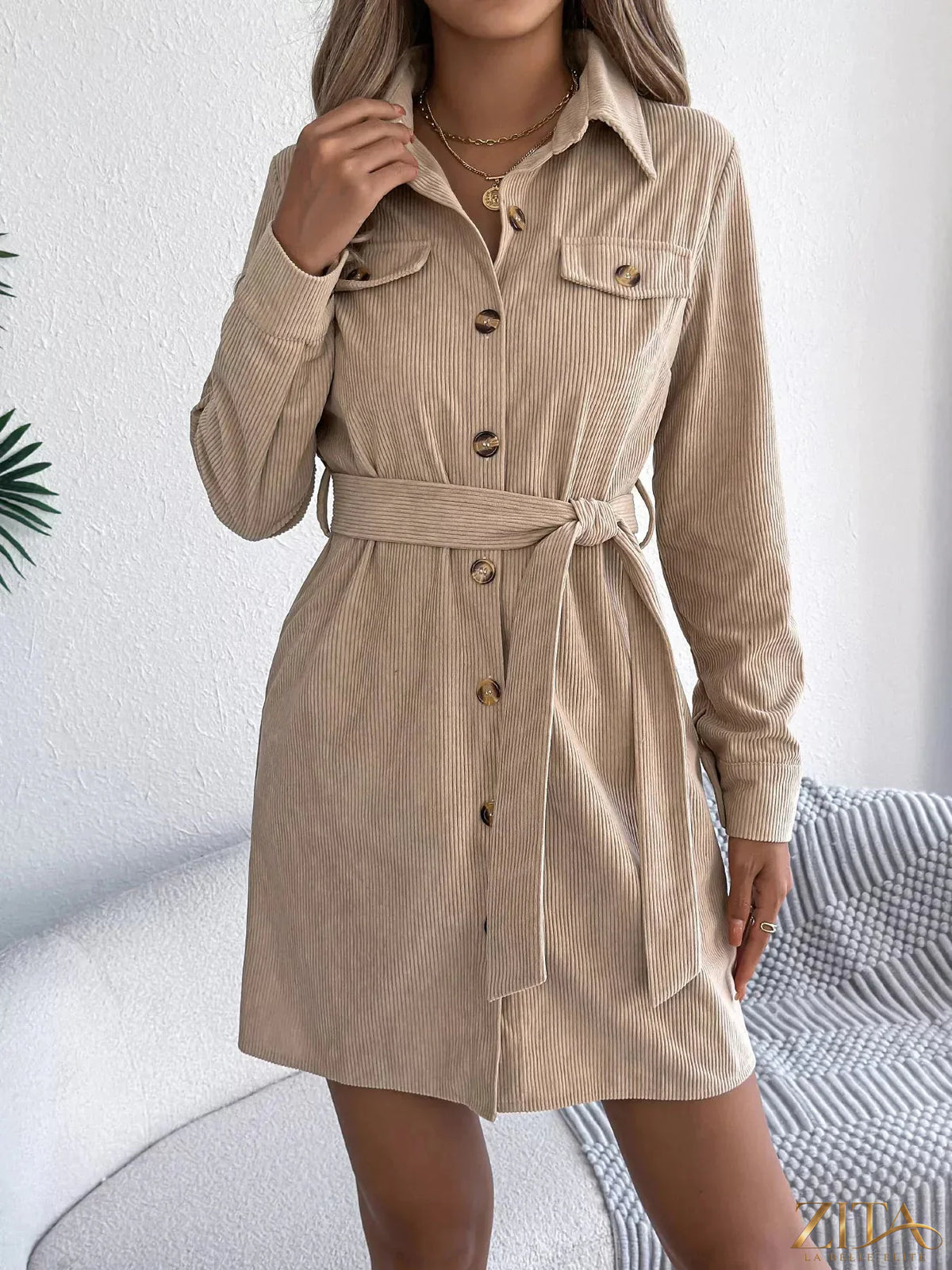 Zita La Belle Elite corduroy button-down shirt dress in a stylish, textured fabric with a collar and front buttons.