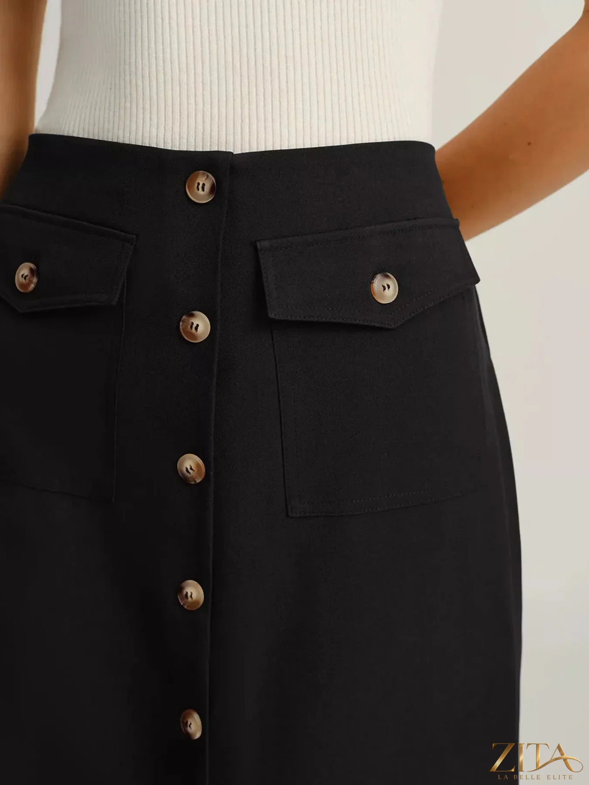 Zita La Belle Elite button-front midi skirt with practical pockets, shown in a stylish and flowy design.