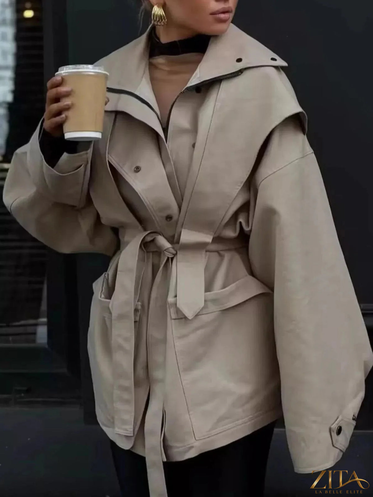 Zita La Belle Elite tie waist snap down trench coat featuring a classic design, collar, and belt, in neutral fabric.