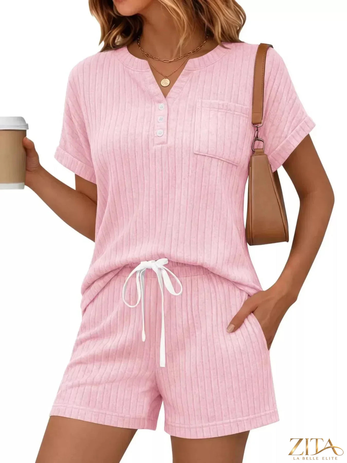 Casual ribbed knit tee and shorts set by Trendsi, featuring a relaxed fit with ribbed texture, perfect for comfortable everyday wear.