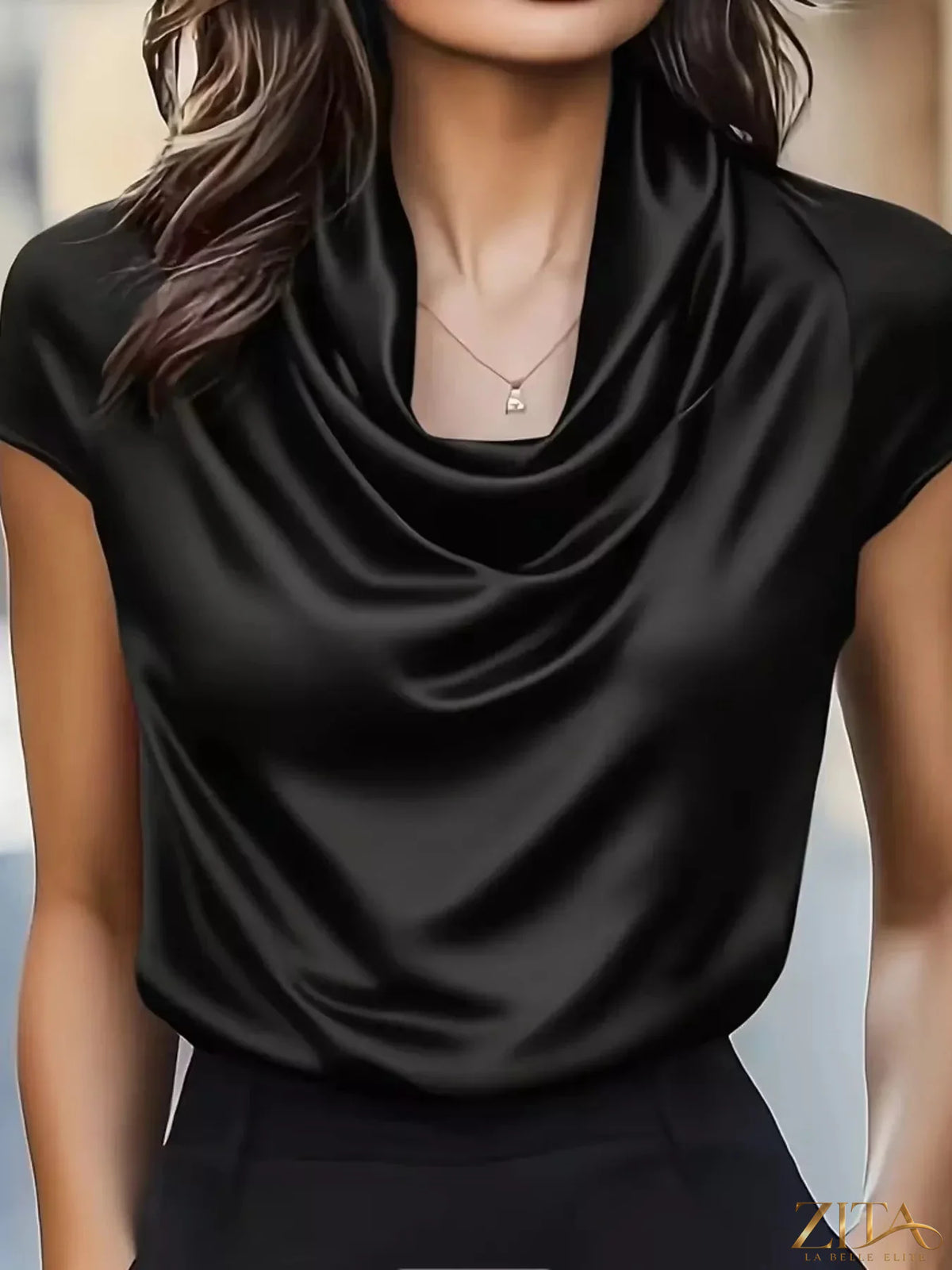 Zita La Belle Elite satin blouse with cowl neck, featuring smooth fabric and elegant drape, shown in a stylish close-up image.