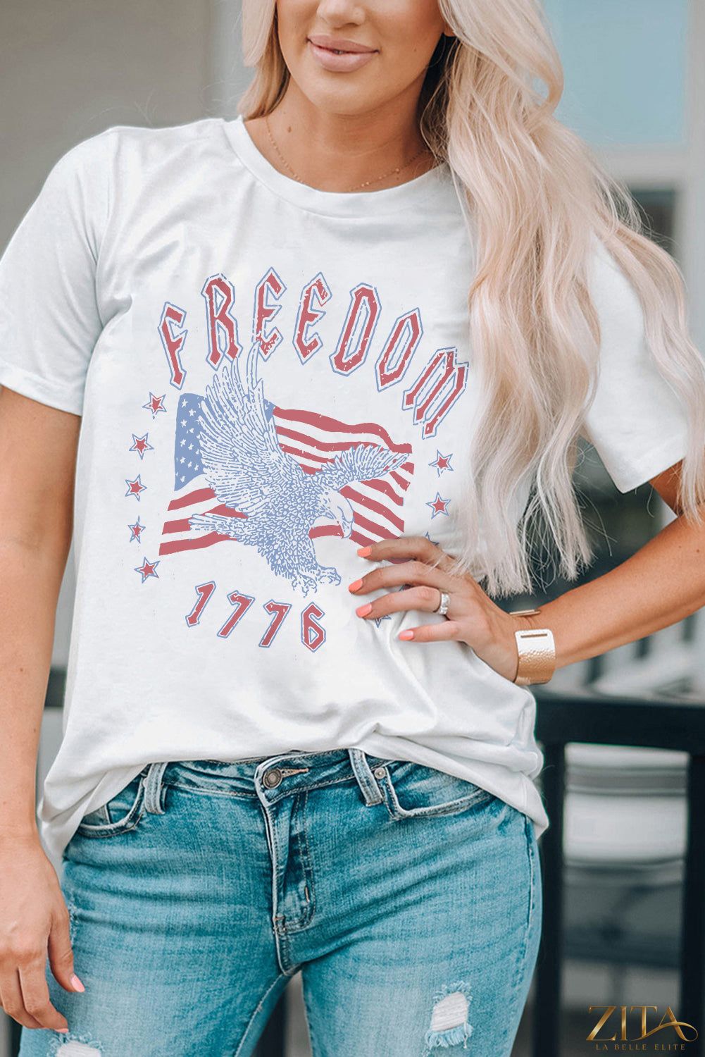 Freedom 1776 graphic T-shirt by Trendsi, featuring a patriotic design with bold colors and a comfortable fit.