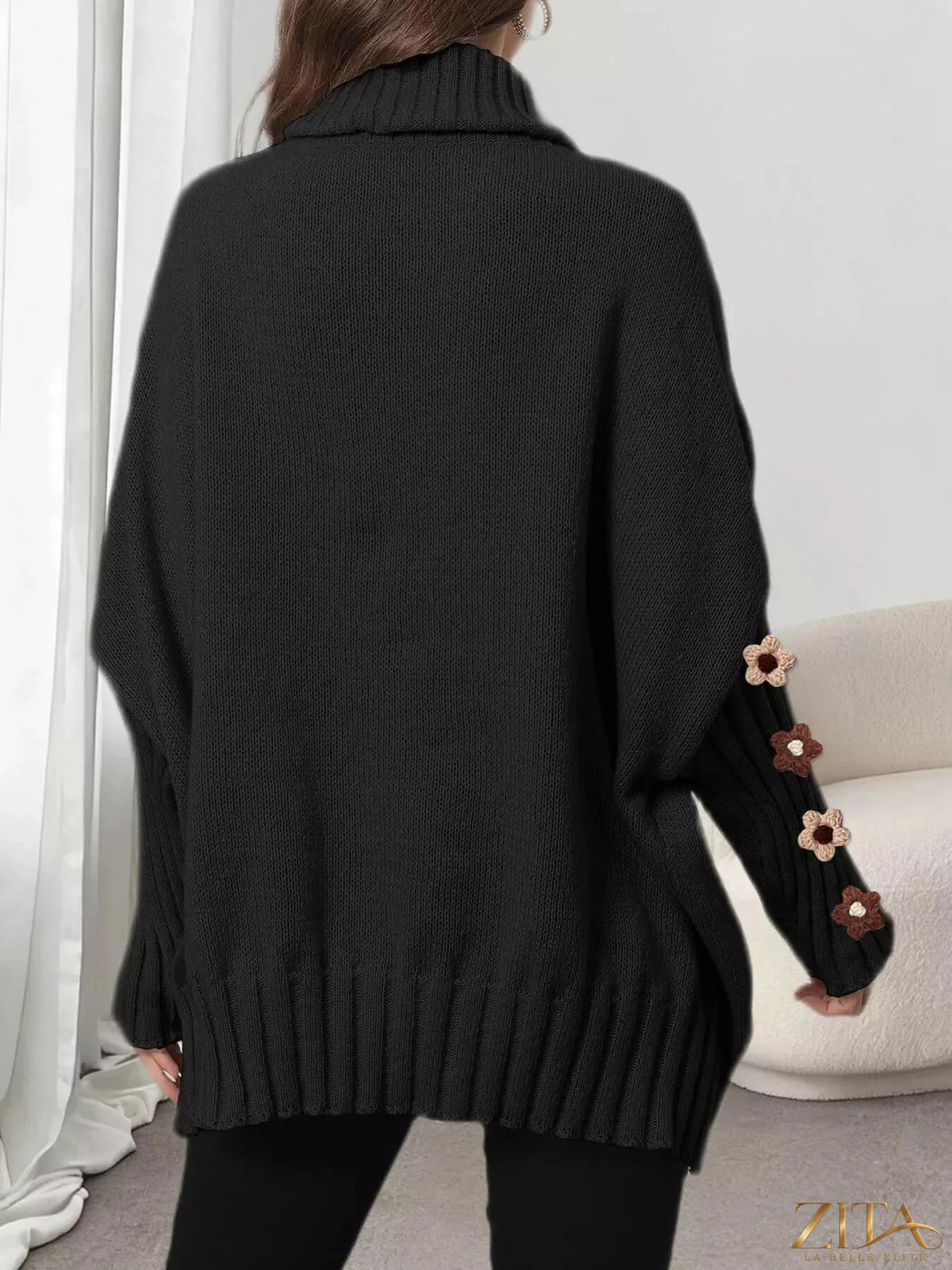Zita La Belle Elite oversized turtleneck sweater with floral applique sleeves, cozy knit design and stylish floral details.
