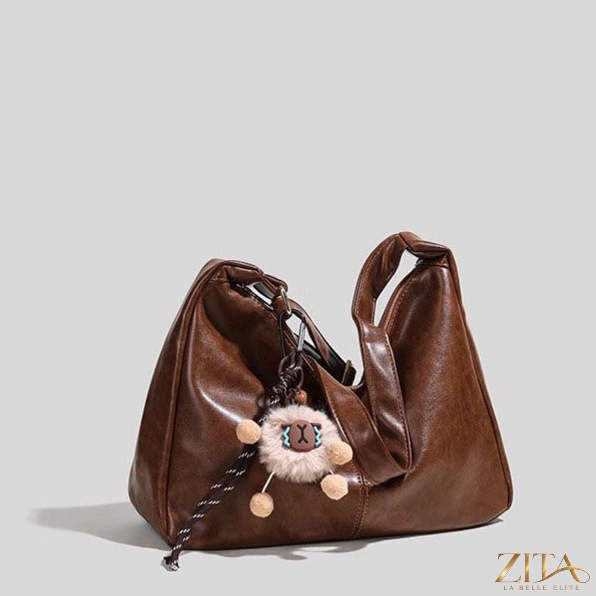 Vintage style hobo shoulder bag by Zita La Belle Elite featuring leather texture and slouchy design, perfect for casual fashion.