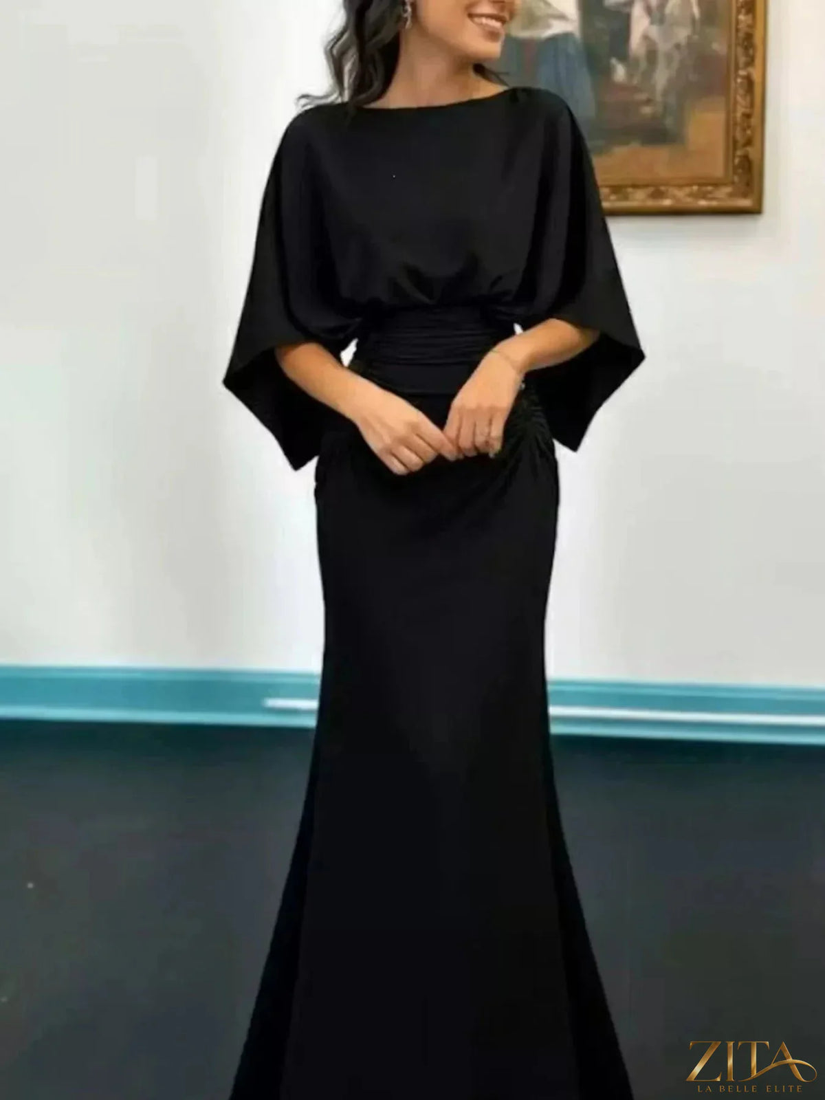 Zita La Belle Elite batwing sleeve ruched maxi dress in flowing fabric, featuring a fitted waist and elegant design.