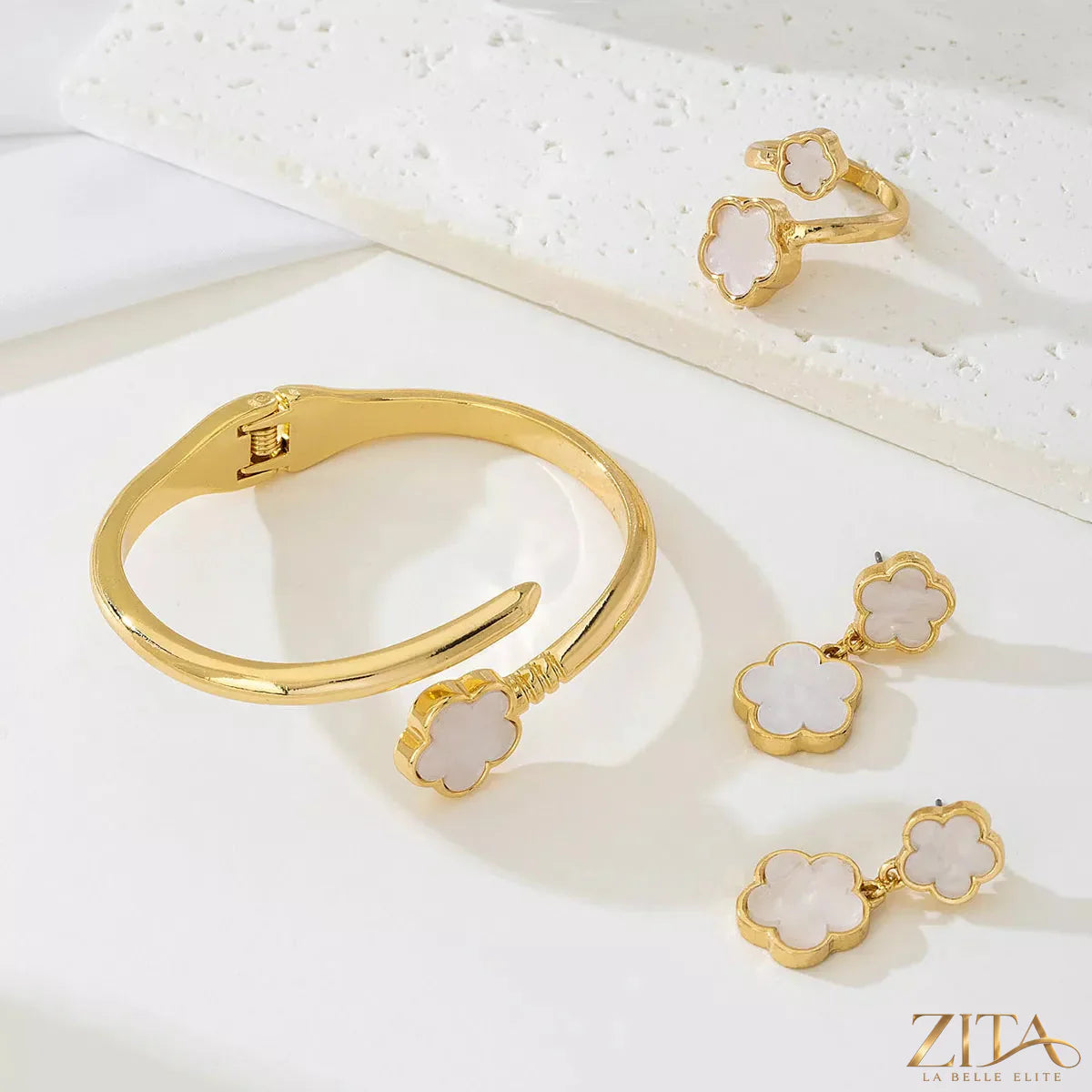 18K gold-plated flower jewelry set by Zita La Belle Elite featuring a necklace and earrings with floral design.