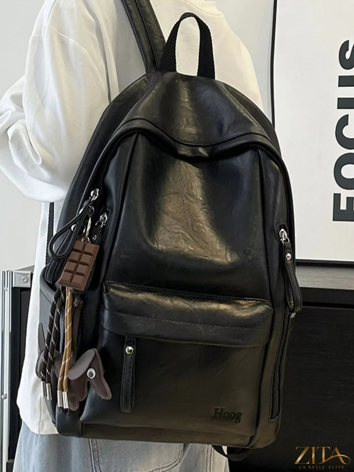 Leather texture backpack bag with adjustable straps and front pocket, stylish and durable Trendsi backpack for everyday use.