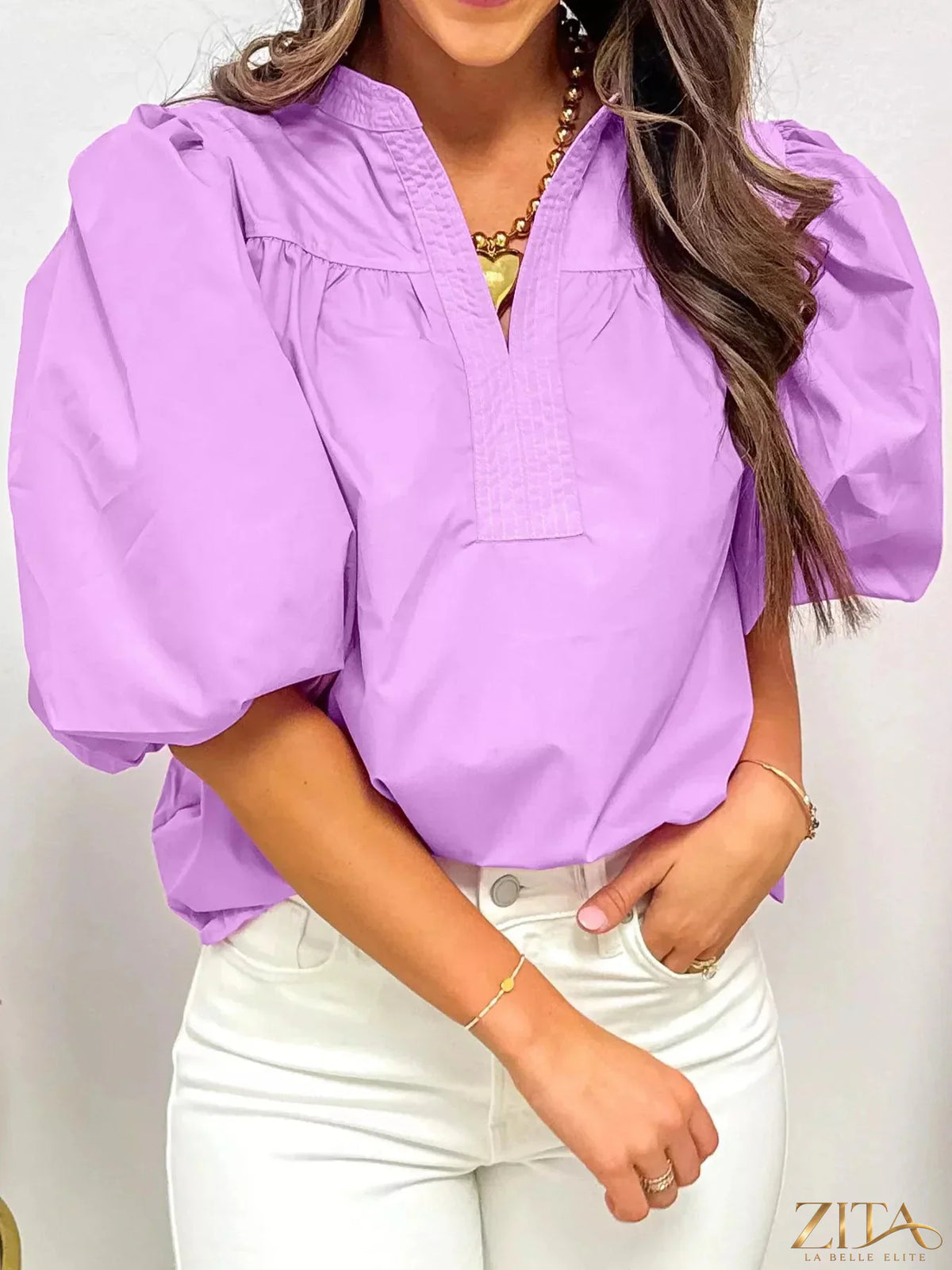 Zita La Belle Elite notched puff sleeve blouse featuring stylish puffed sleeves and a tailored fit, shown in a close-up front view.