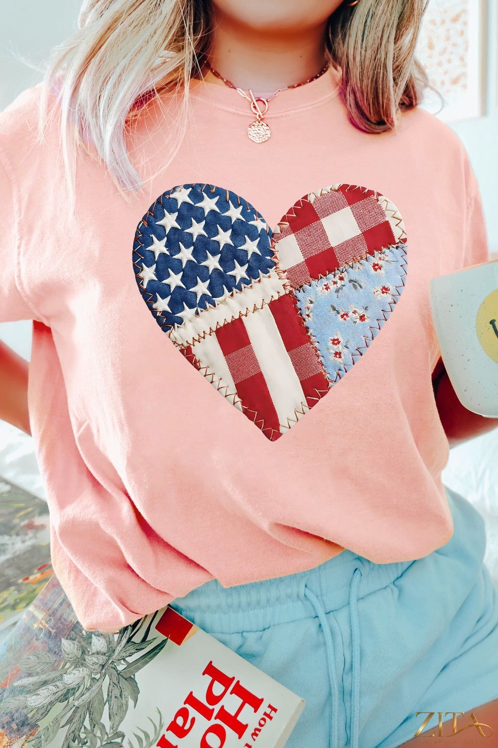Red, white, and blue patriotic heart round neck T-shirt by Trendsi, featuring a colorful heart graphic on a classic tee.