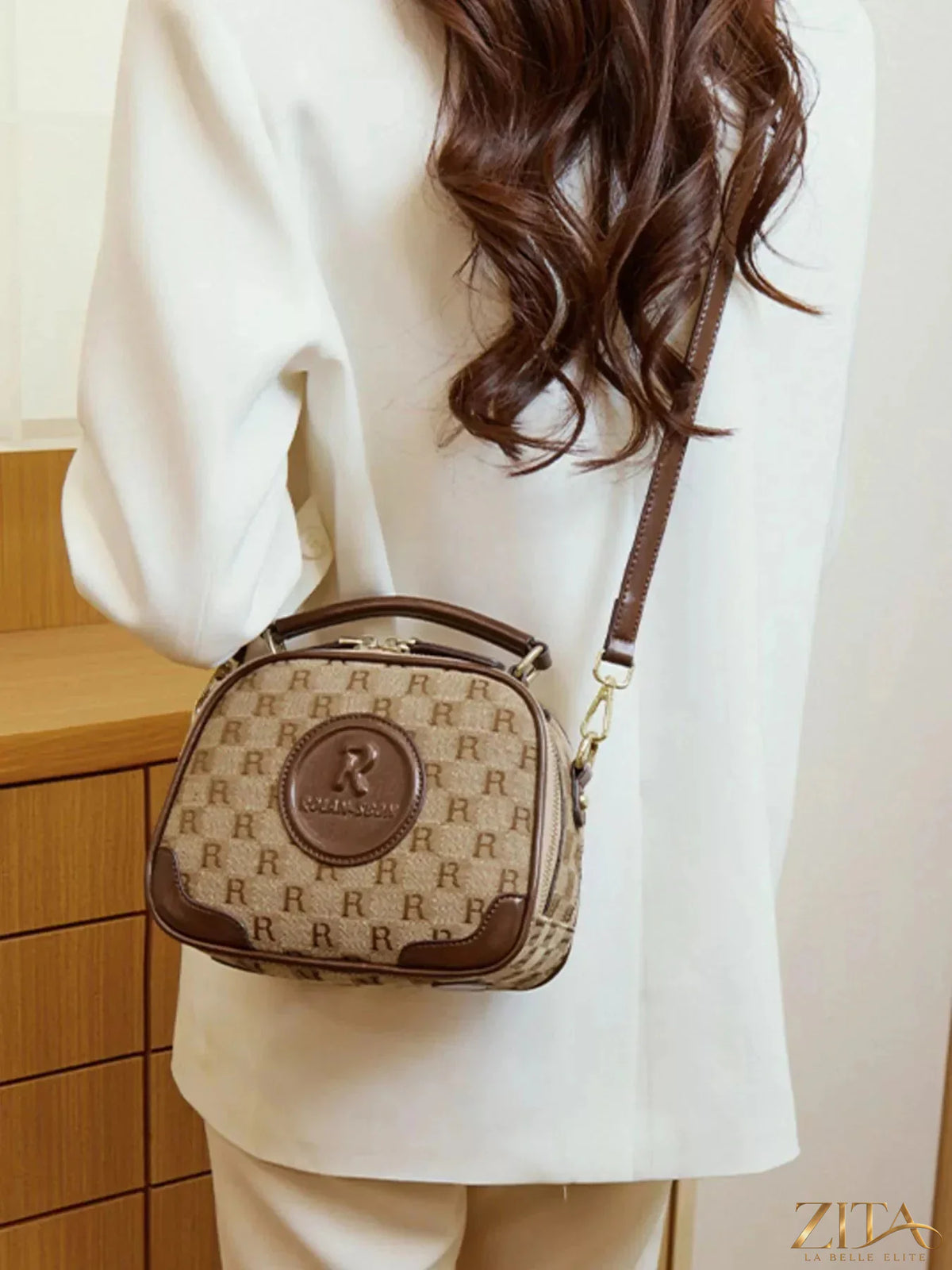 Zita La Belle Elite monogram pattern crossbody handbag with top handle, showcasing elegant design and stylish accessories.