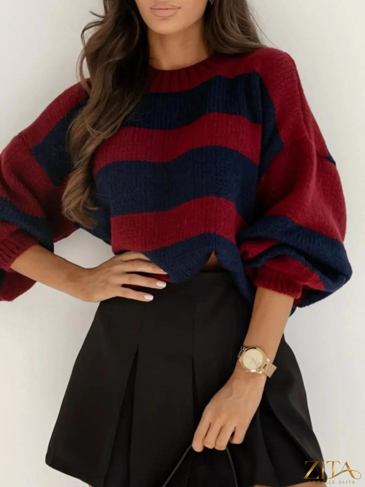 Striped dropped shoulder sweater by Trendsi featuring a casual fit and stylish knit design, perfect for cozy everyday wear.