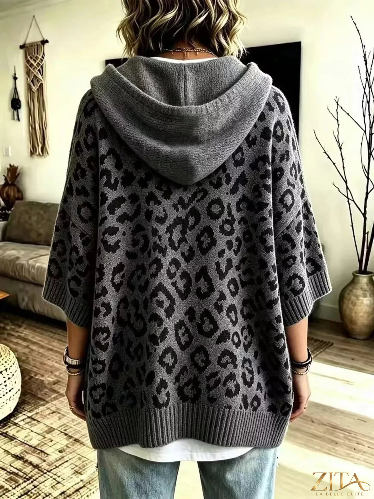 Zita La Belle Elite leopard print hooded sweater with drawstring, cozy knit fabric, and front pocket for casual style and comfort.