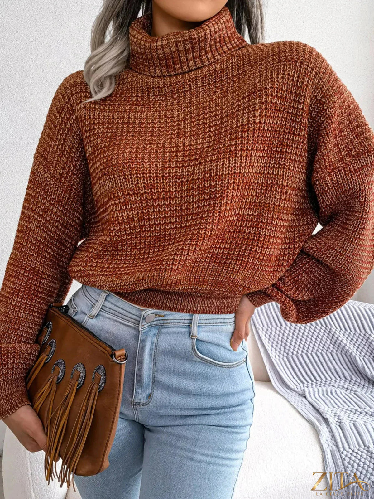 Light beige turtleneck dropped shoulder sweater by Trendsi, featuring a cozy fit and soft knit fabric.