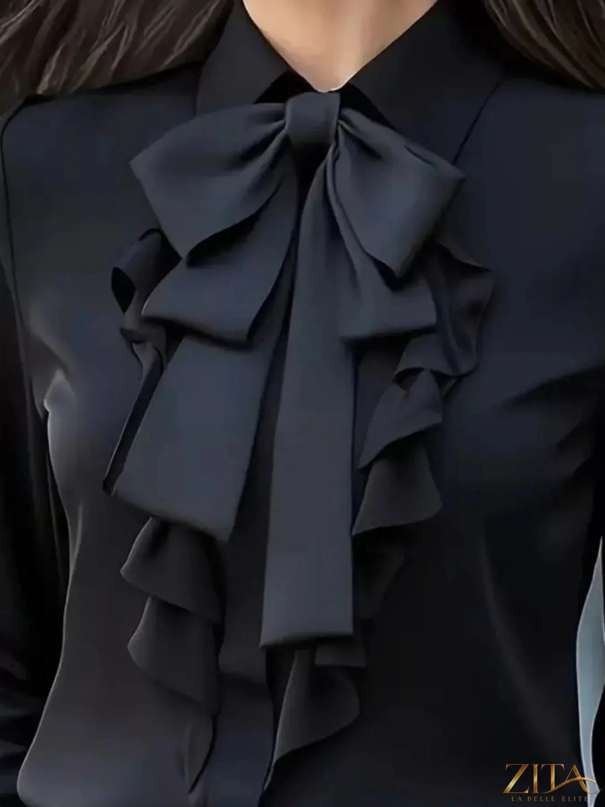 Zita La Belle Elite ruffled tie-front long sleeve blouse with feminine details and lightweight fabric on a model.