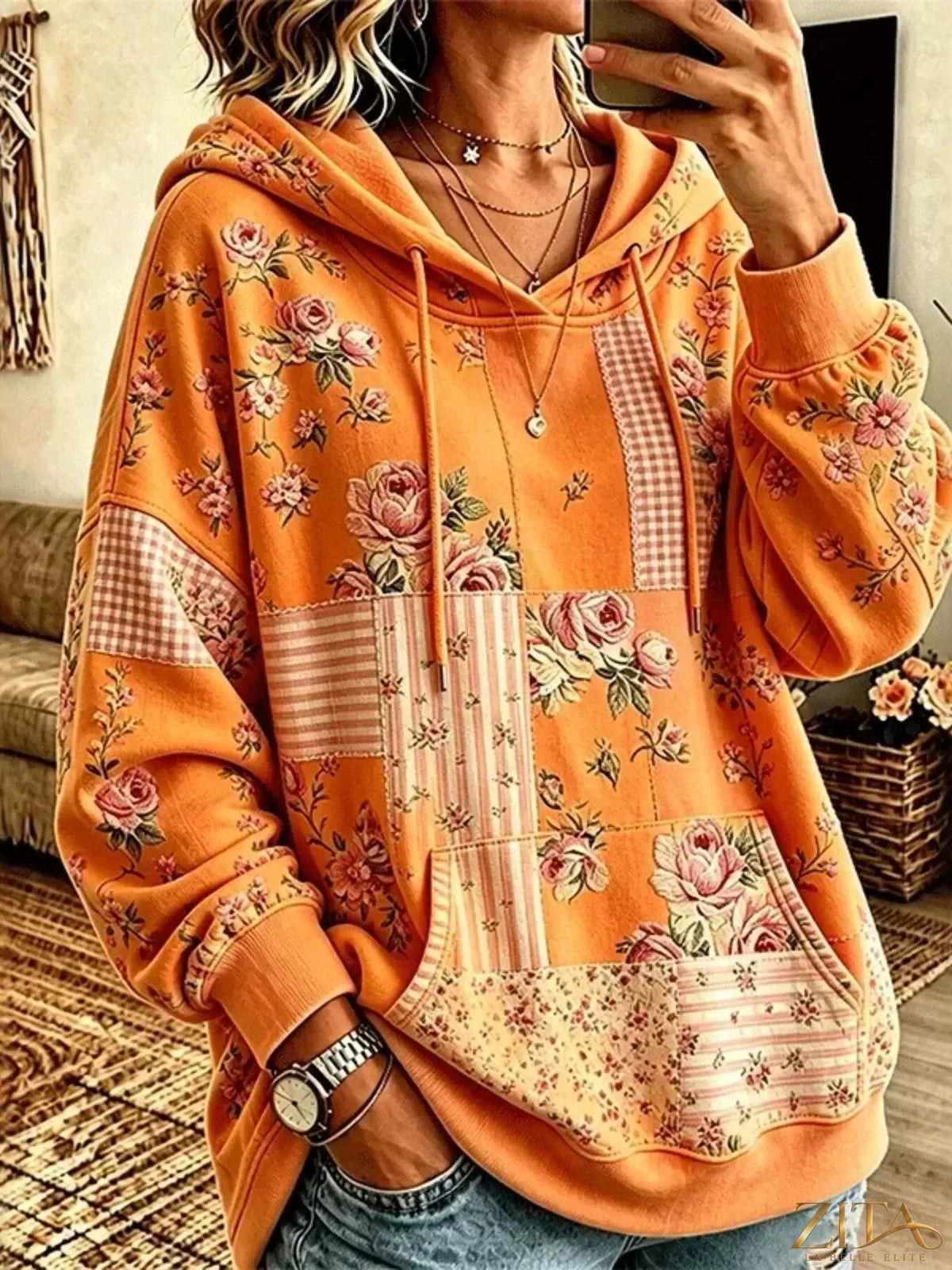 Plus size floral drawstring hoodie with dropped shoulders from Zita La Belle Elite, featuring a full-size, casual and comfortable fit.