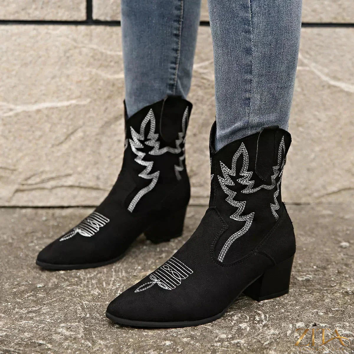Zita La Belle Elite point toe block heel boots featuring sleek black leather and stylish ankle height design.