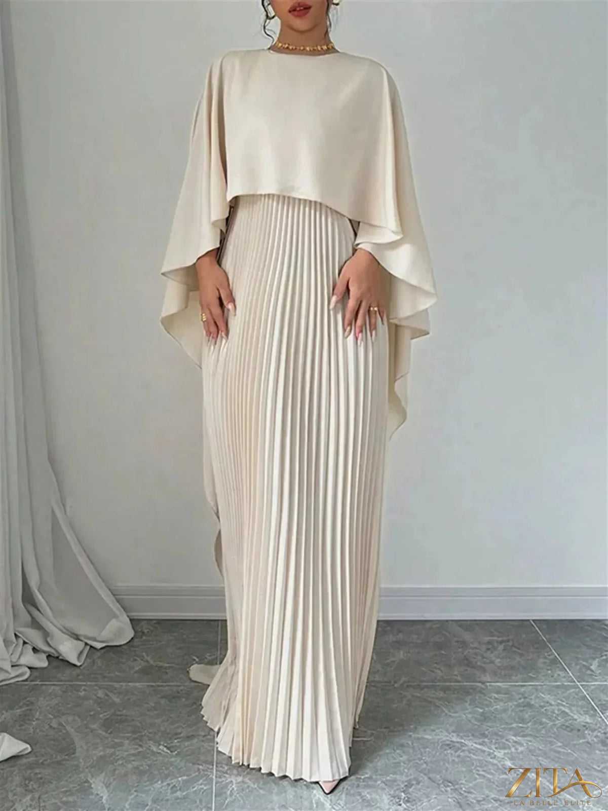 Elegant blue cape pleated maxi dress from Trendsi with flowing fabric and stylish design, perfect for formal occasions.