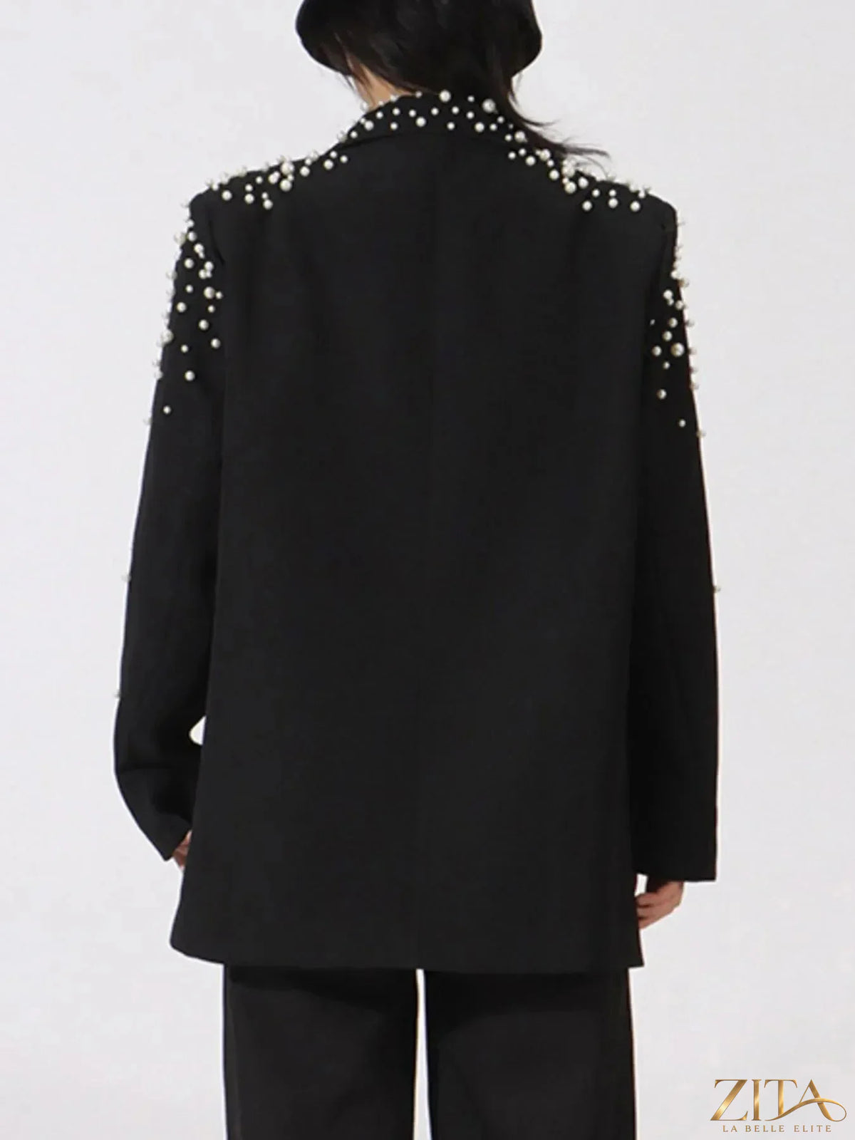 Pearl-embellished double-breasted blazer from Trendsi, featuring elegant pearl details and tailored fit.