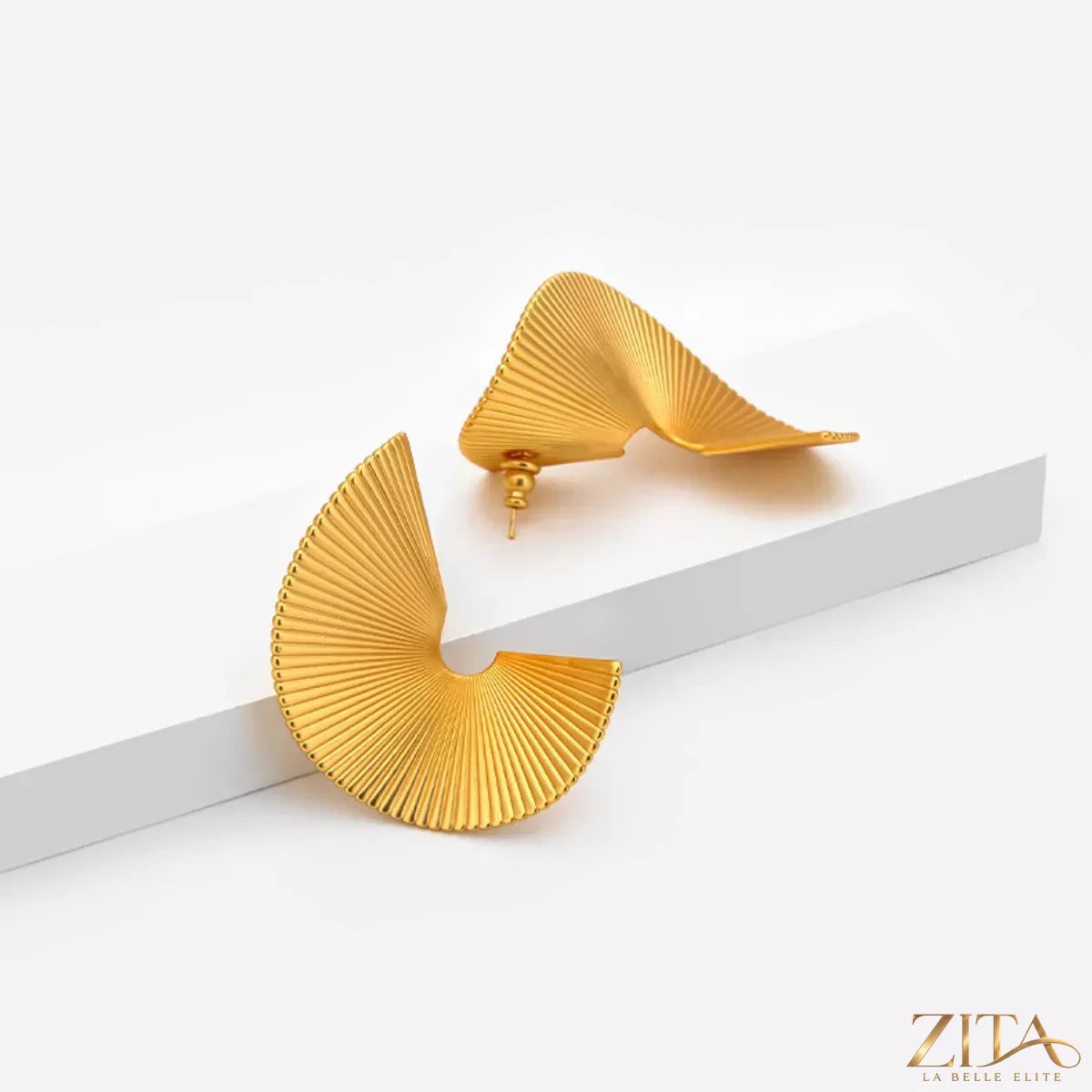 Gold-plated copper fan-shaped earrings with intricate design, featuring 18K gold plating and stylish dangle style.