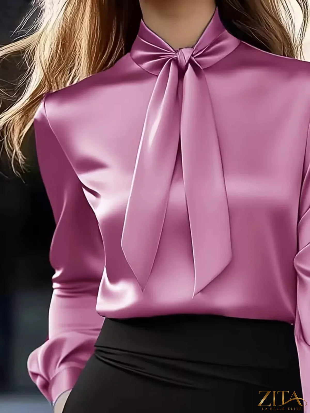 Zita La Belle Elite satin bow tie long sleeve blouse with a sleek design, featuring a stylish bow detail at the neckline.