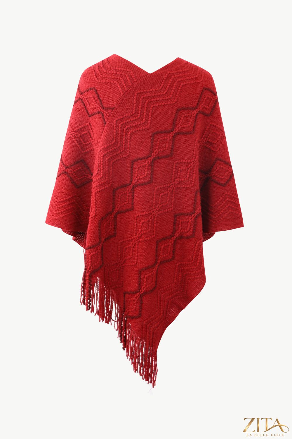 Pearl trim v-neck fringe hem poncho in soft fabric, featuring elegant pearl details and stylish design for a chic layered look.